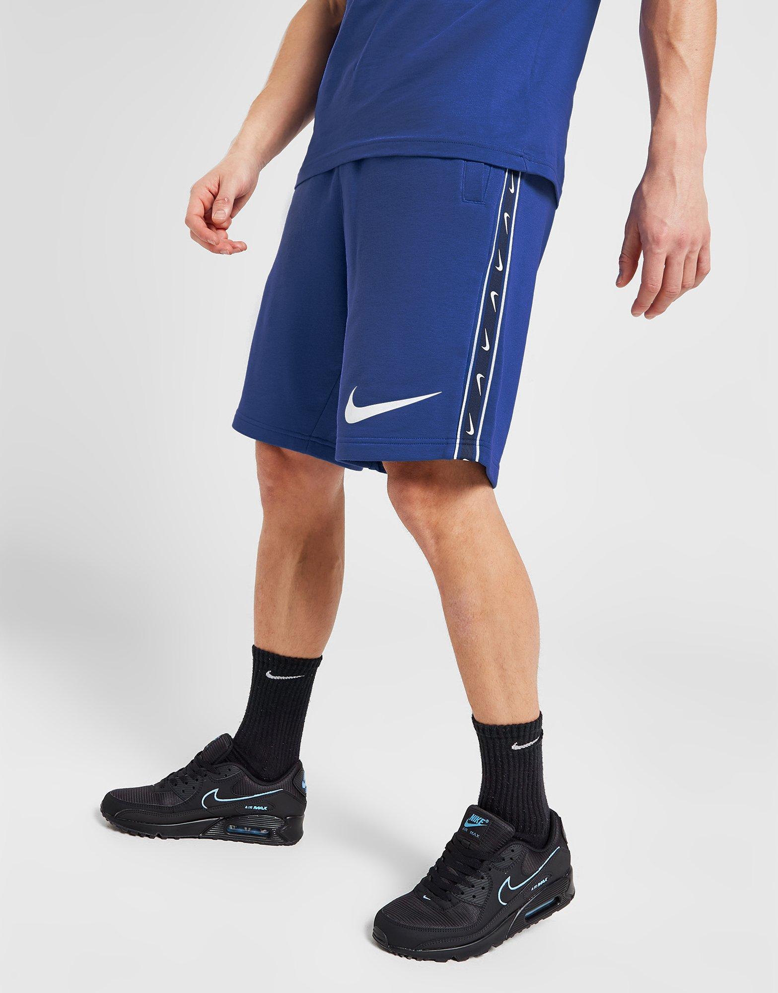 Nike deals taped shorts