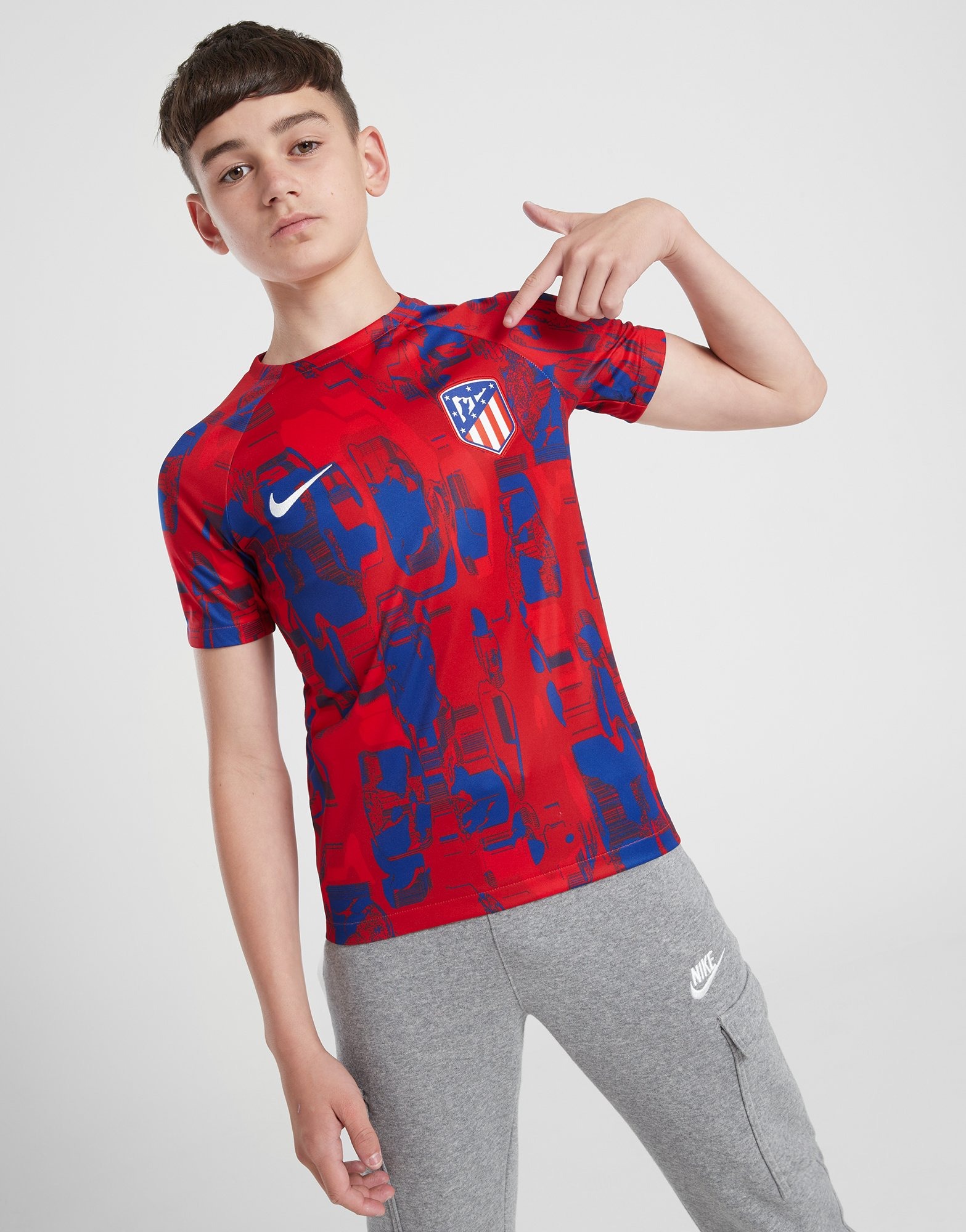 Red Nike Atletico Madrid Academy Pre Match Shirt Junior | JD Sports UK