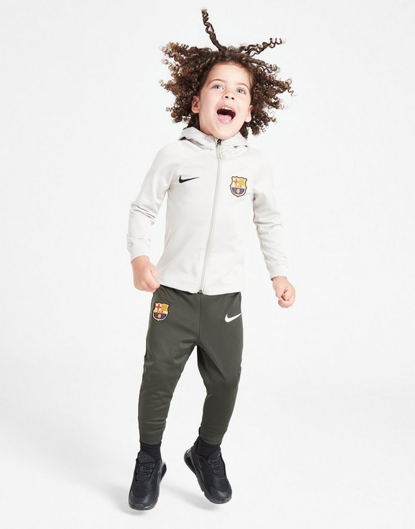 tos Compasión visual Nike chándal FC Barcelona Strike para bebé en Gris | JD Sports España