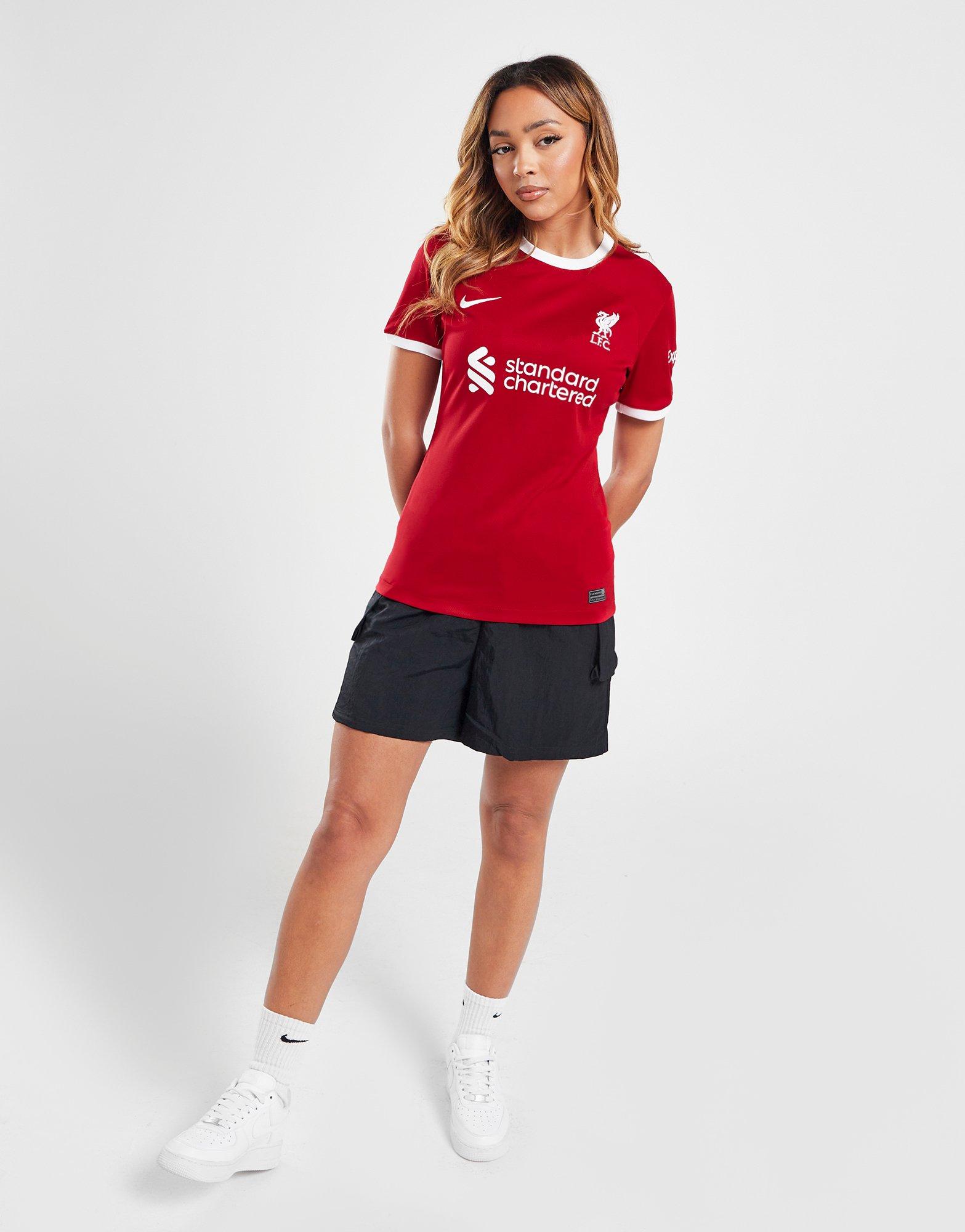 Girl wearing liverpool clearance shirt