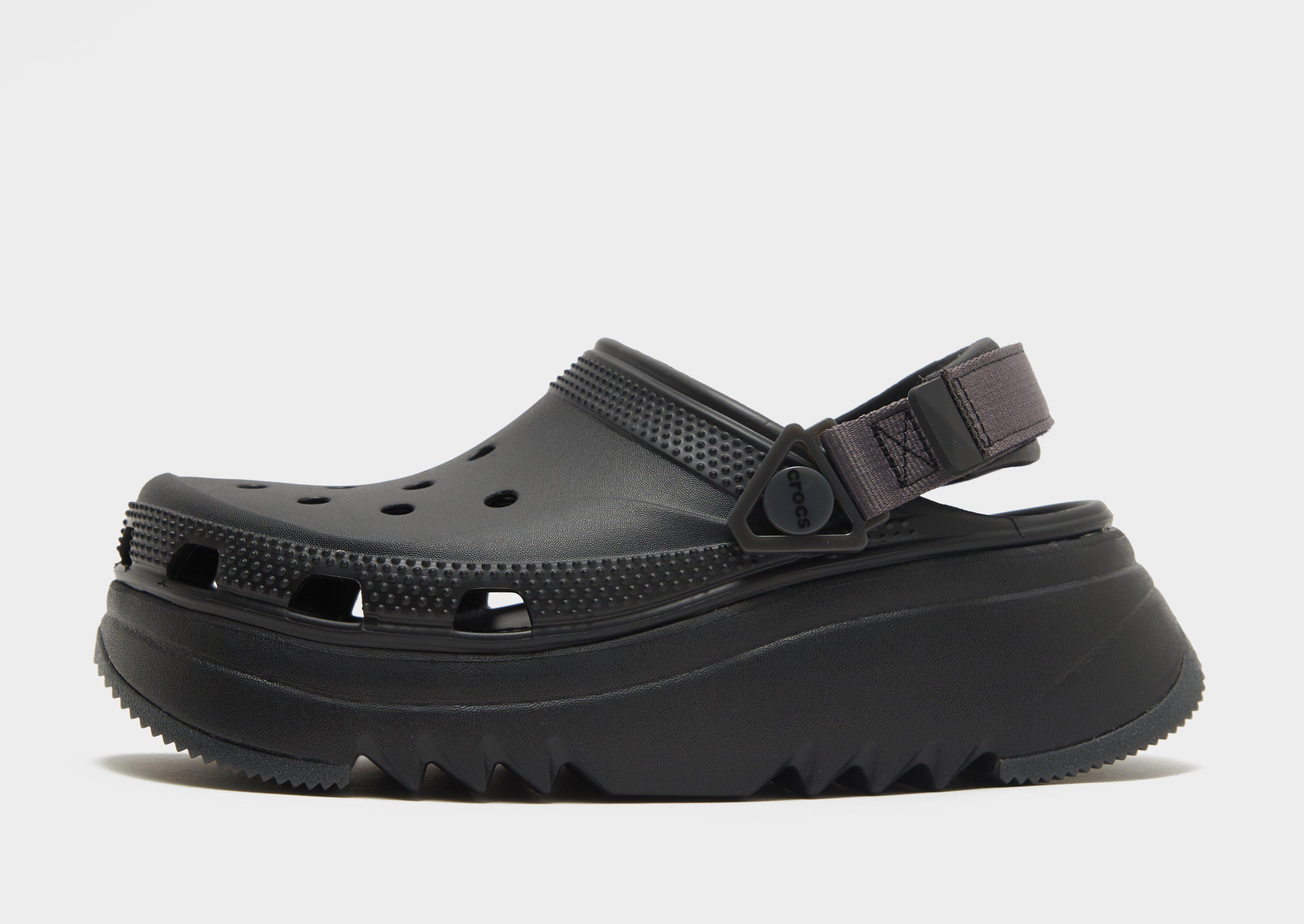 Black platform best sale crocs with flowers