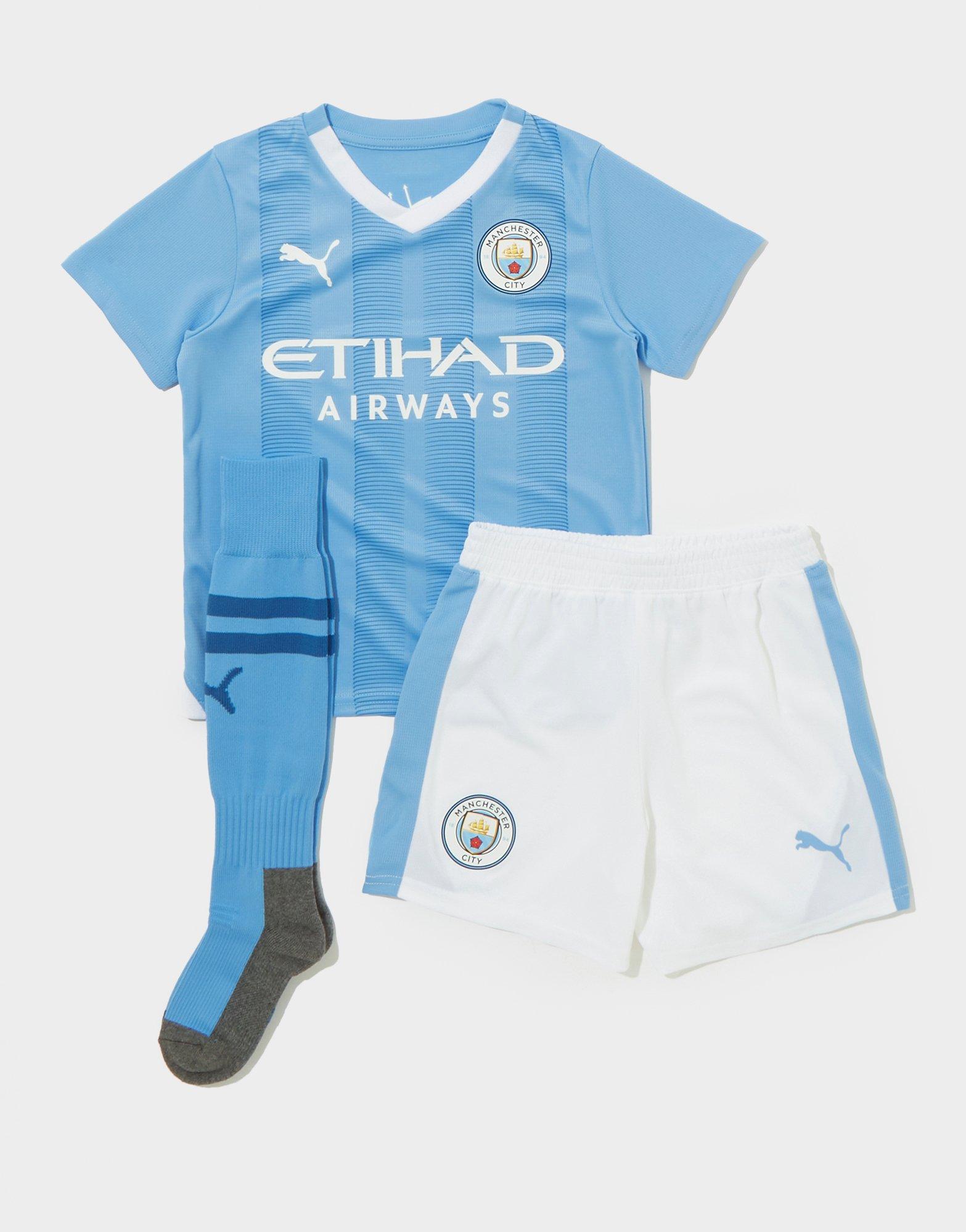 Man city store junior home shorts