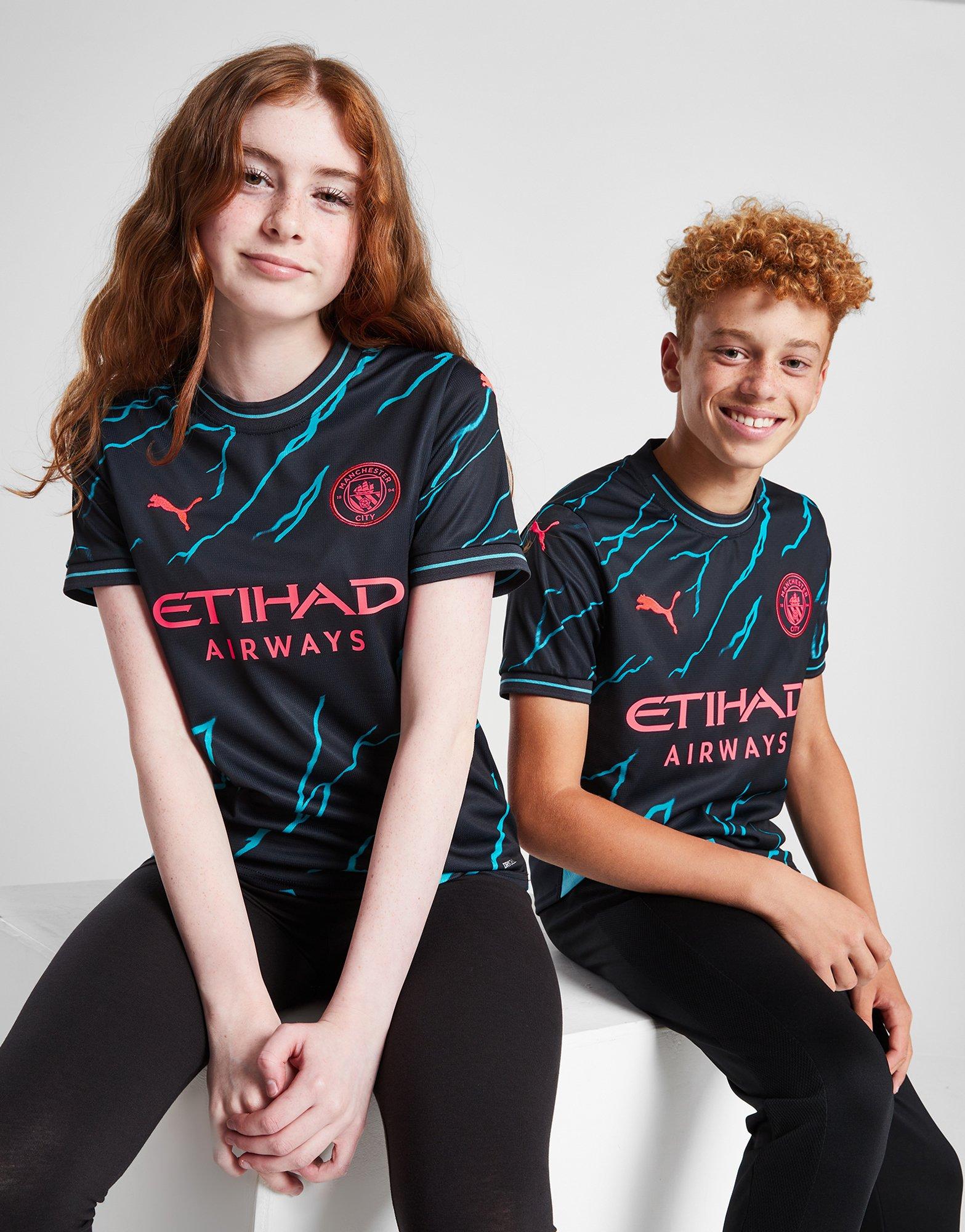 Manchester city best sale away kit junior