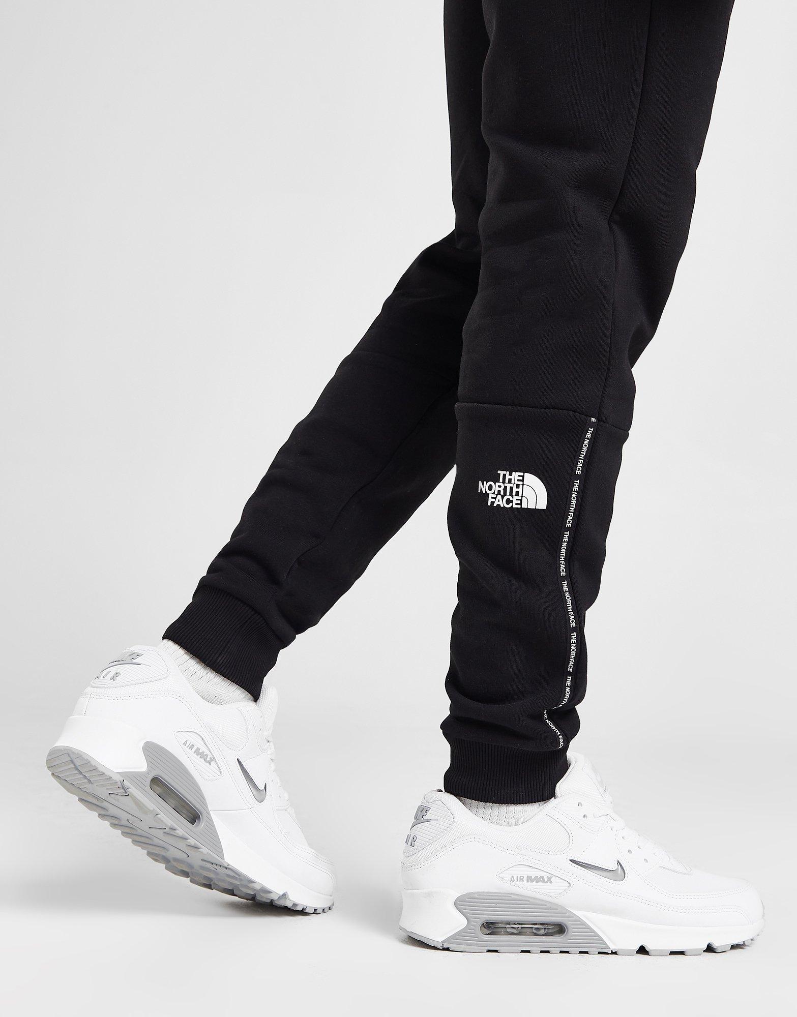 The north face tape poly joggers sale