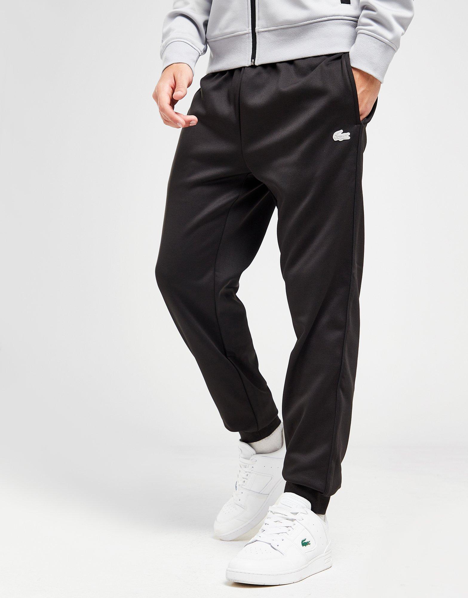 Lacoste pantalón de chándal Poly en Negro