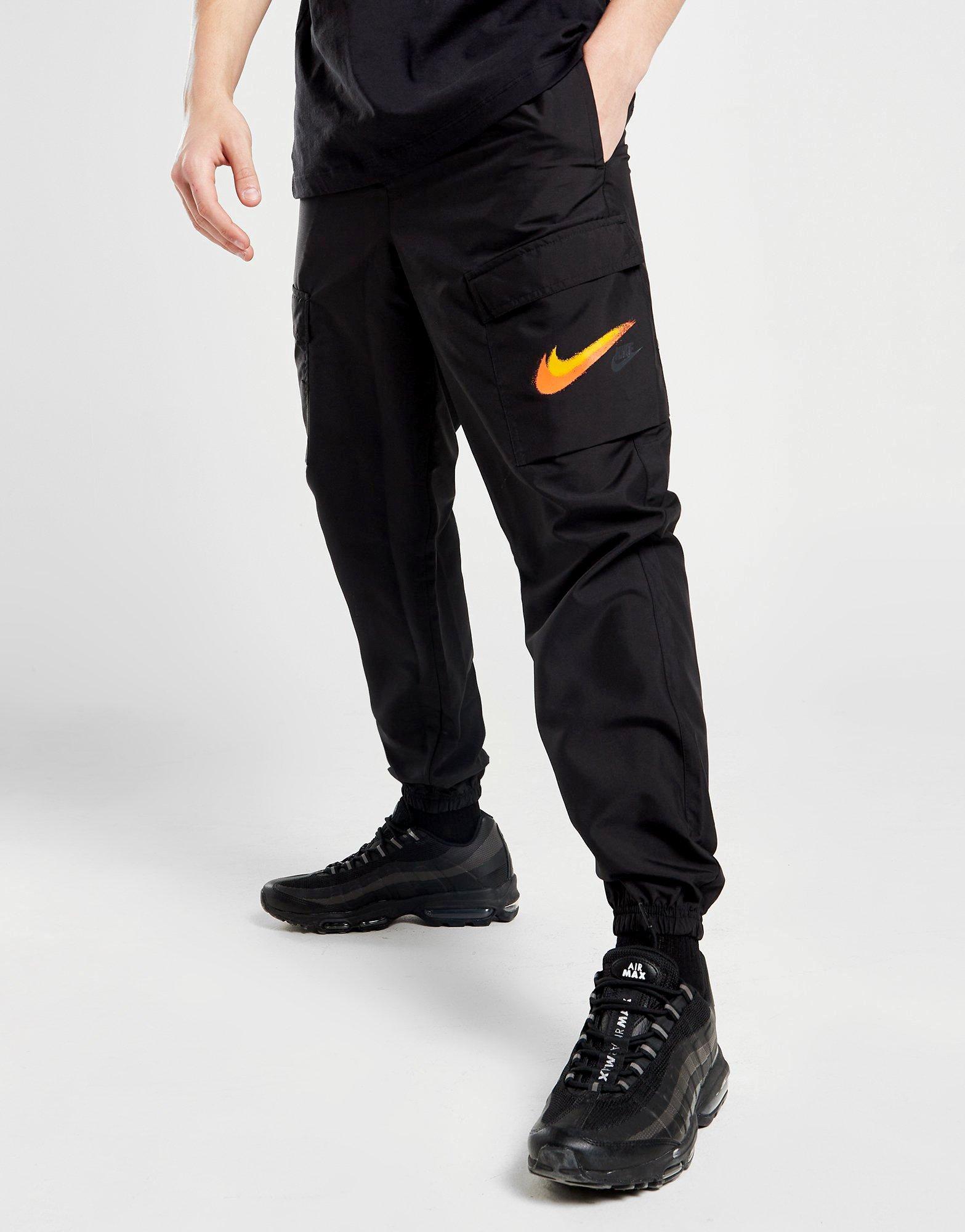 Pantalons de Survêtement Femme, Nike Pantalon cargo Sportswear pour Noir