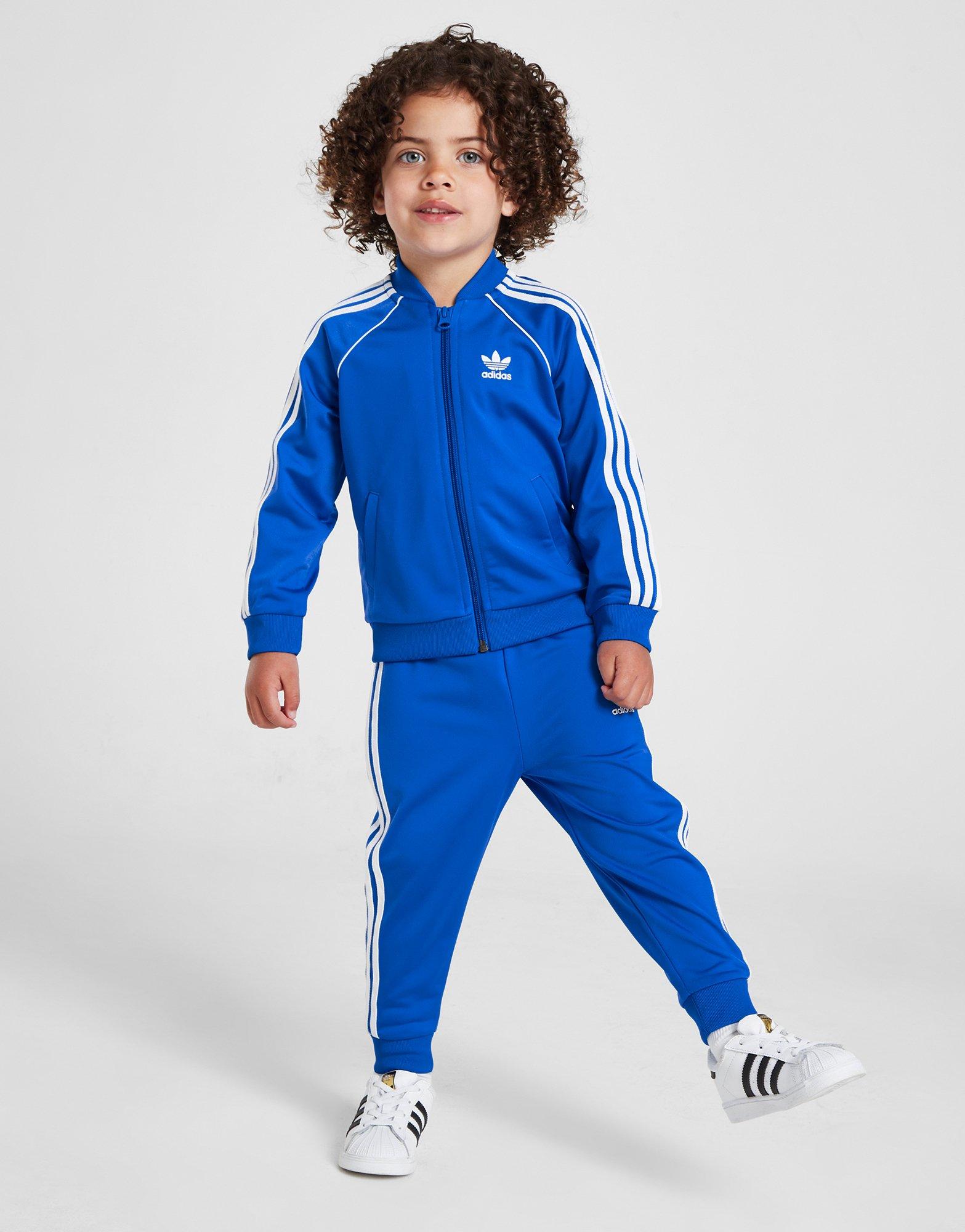 pantalon de jogging bebe garcon avec liseres sur les cotes bleu joggings