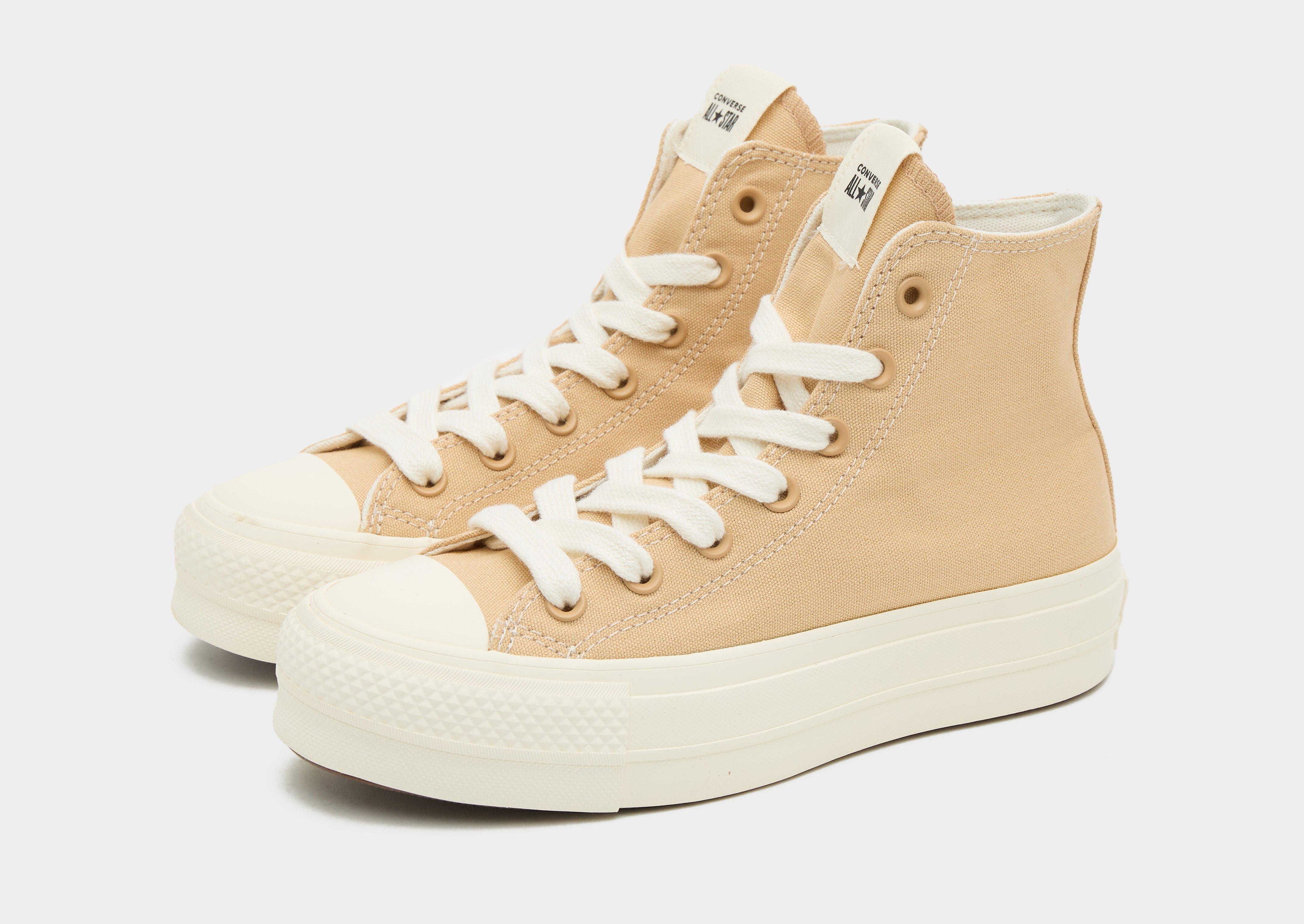 Converse basse plateforme beige hot sale