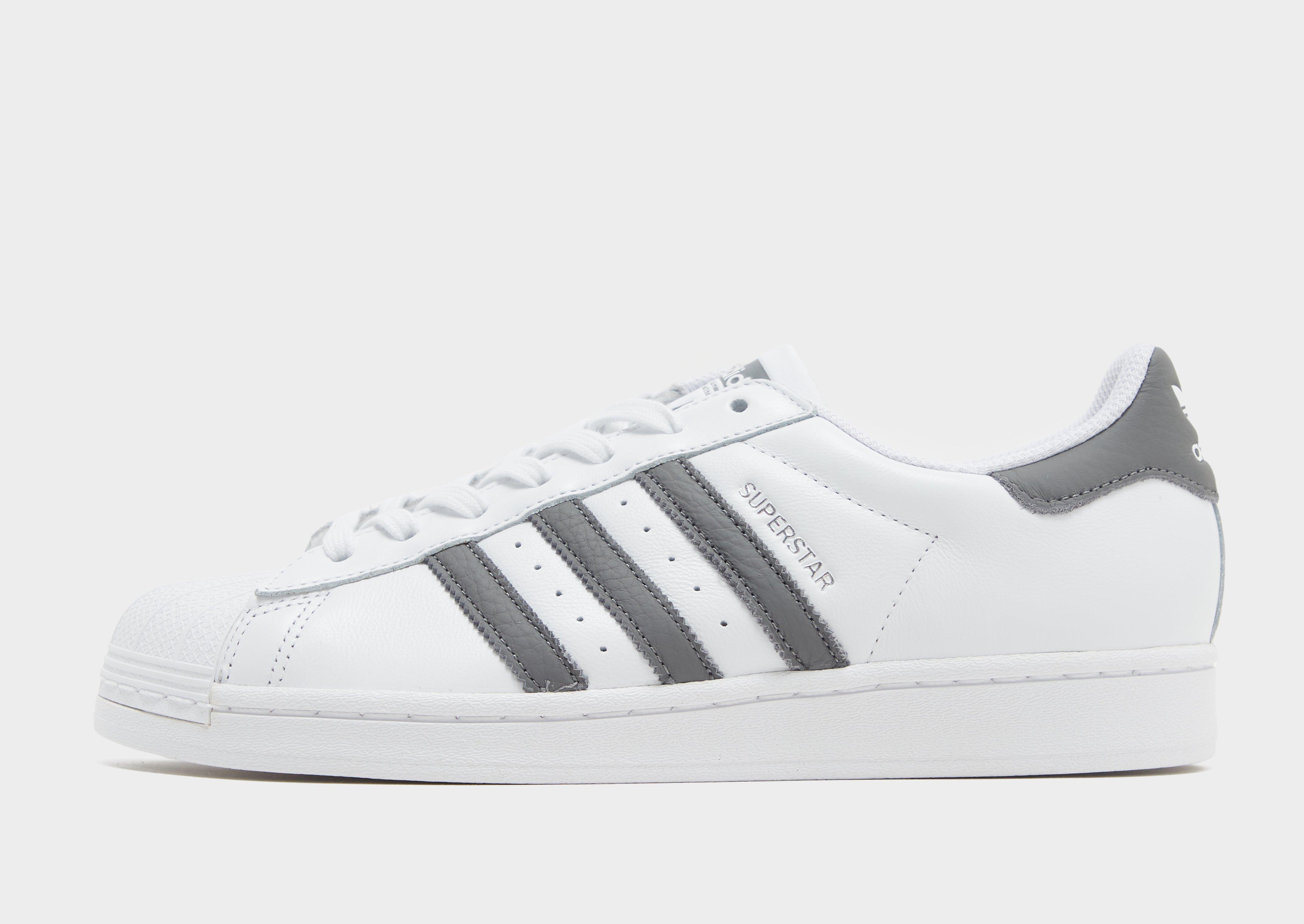 Adidas superstar shop white trainers