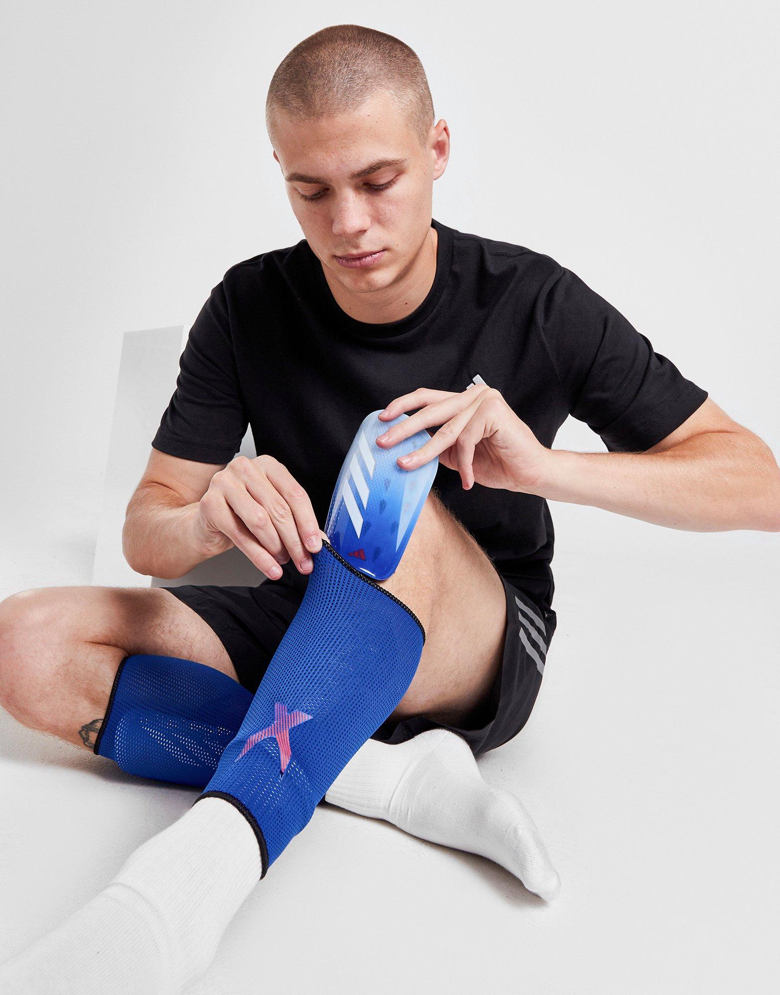 Nike) Charge protège-tibia MERCURIAL LITE en bleu