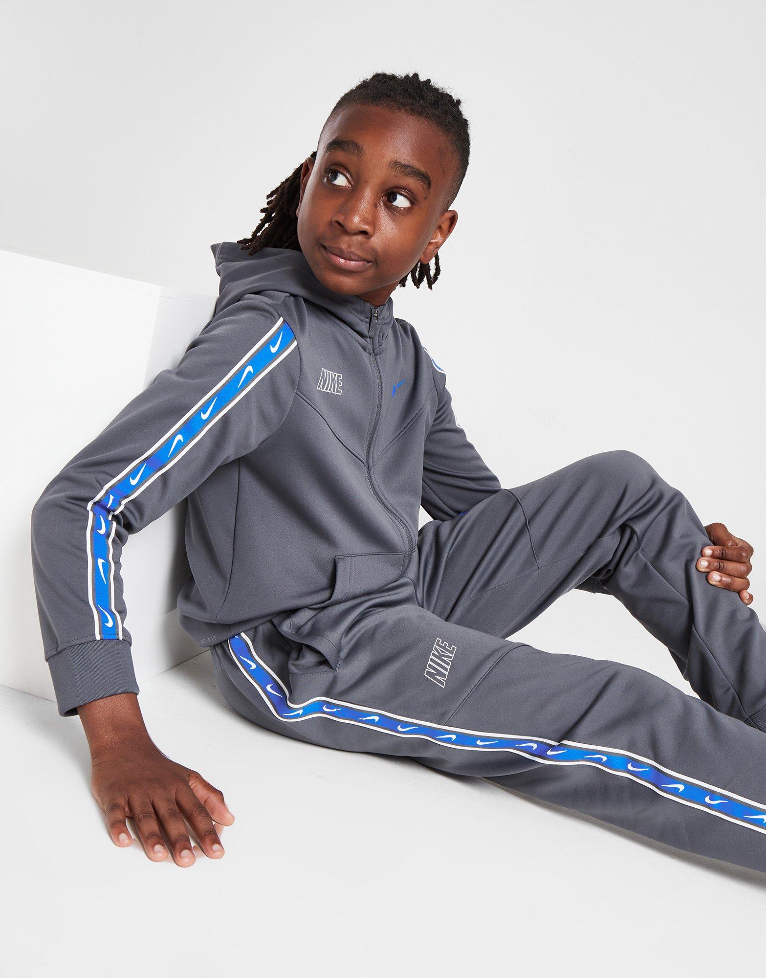 Nike repeat tape poly sales full zip tracksuit children