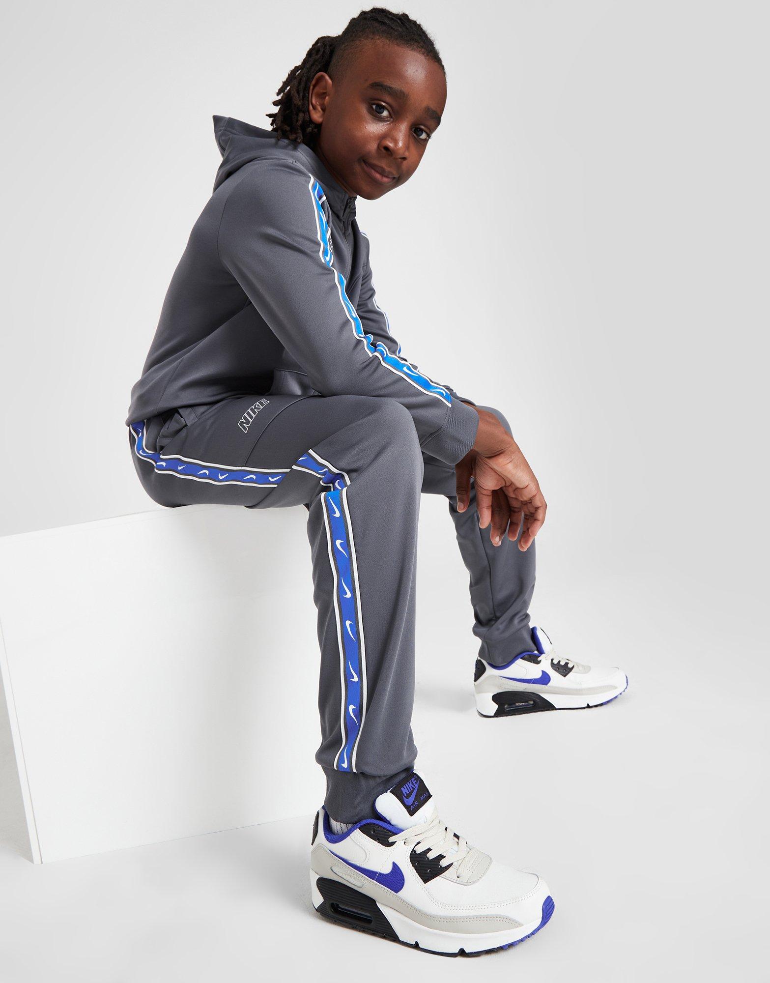 Nike tribute poly track pants on sale