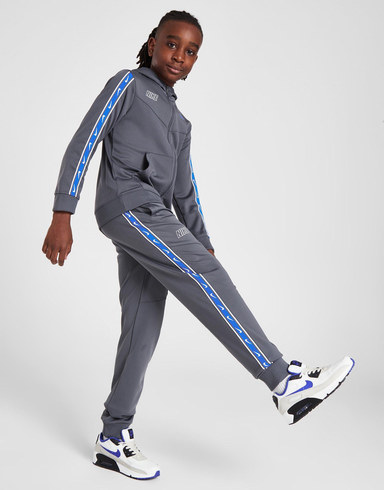 Nike pantaloni store taped poly track