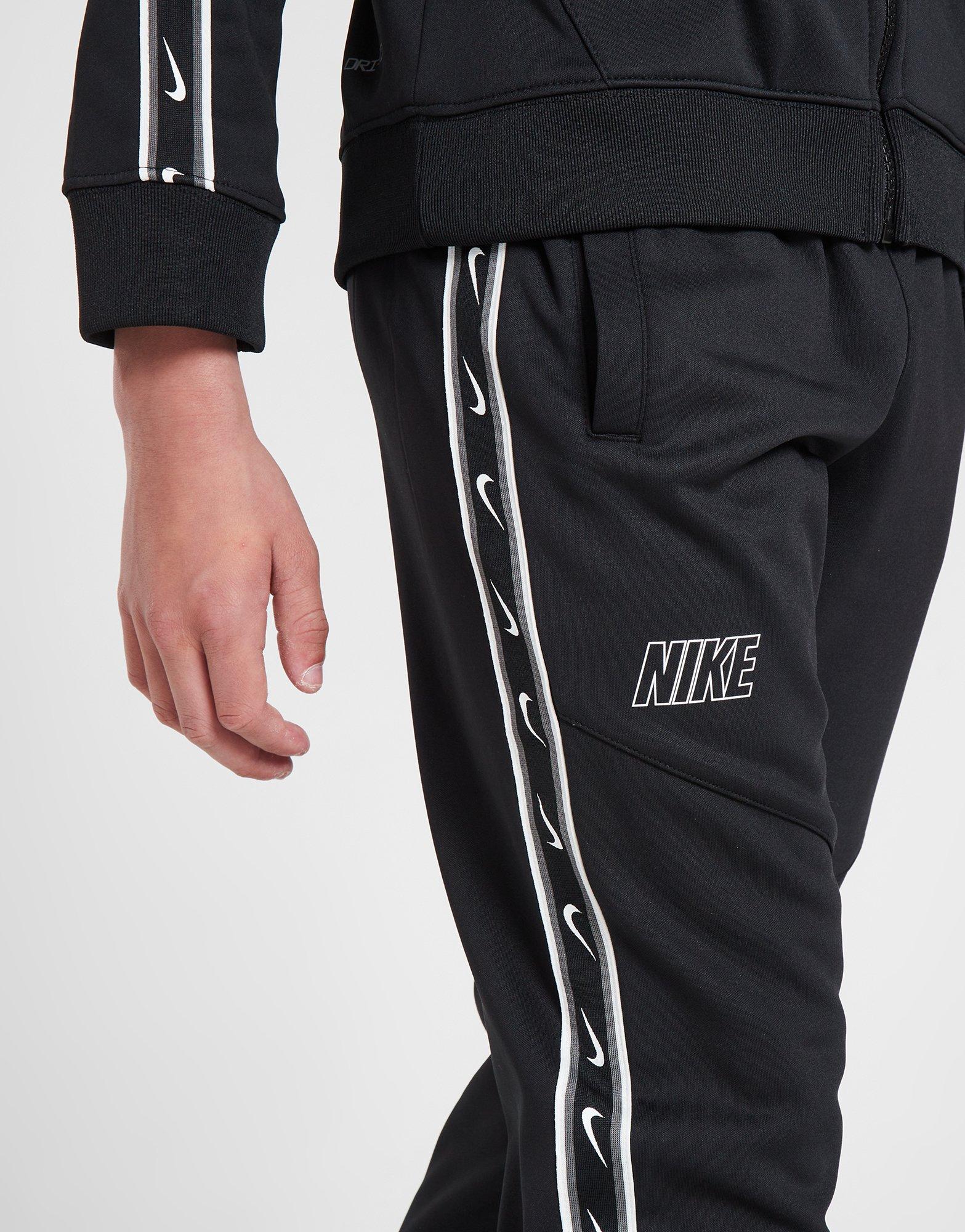 Nike repeat taped store poly pant