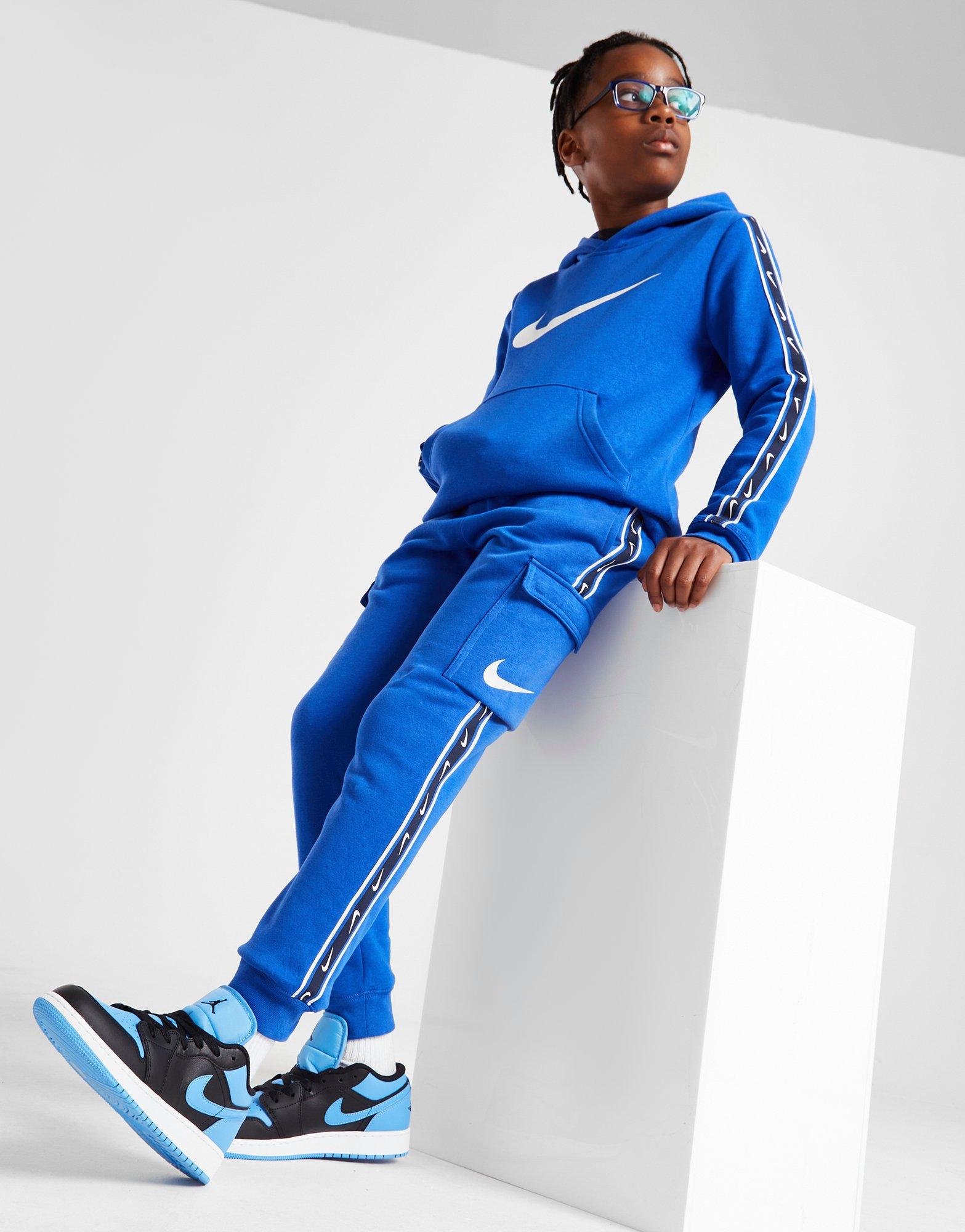 Nike repeat best sale print tracksuit