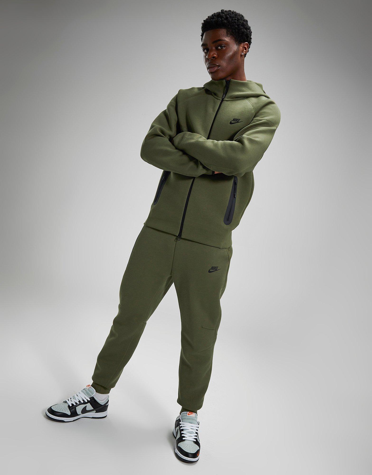 Olive green nike tech 2024 pants