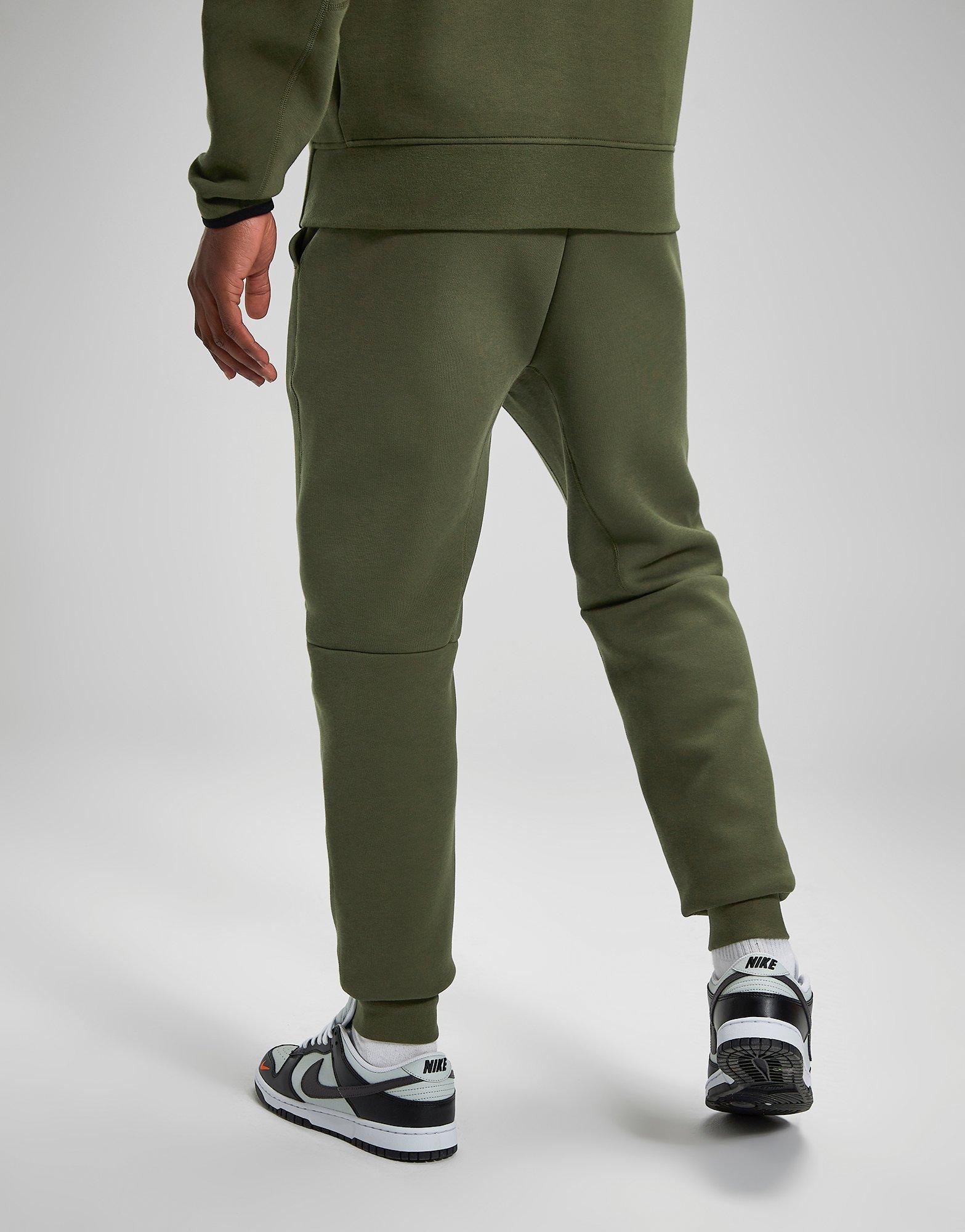 Olive green best sale nike tech joggers