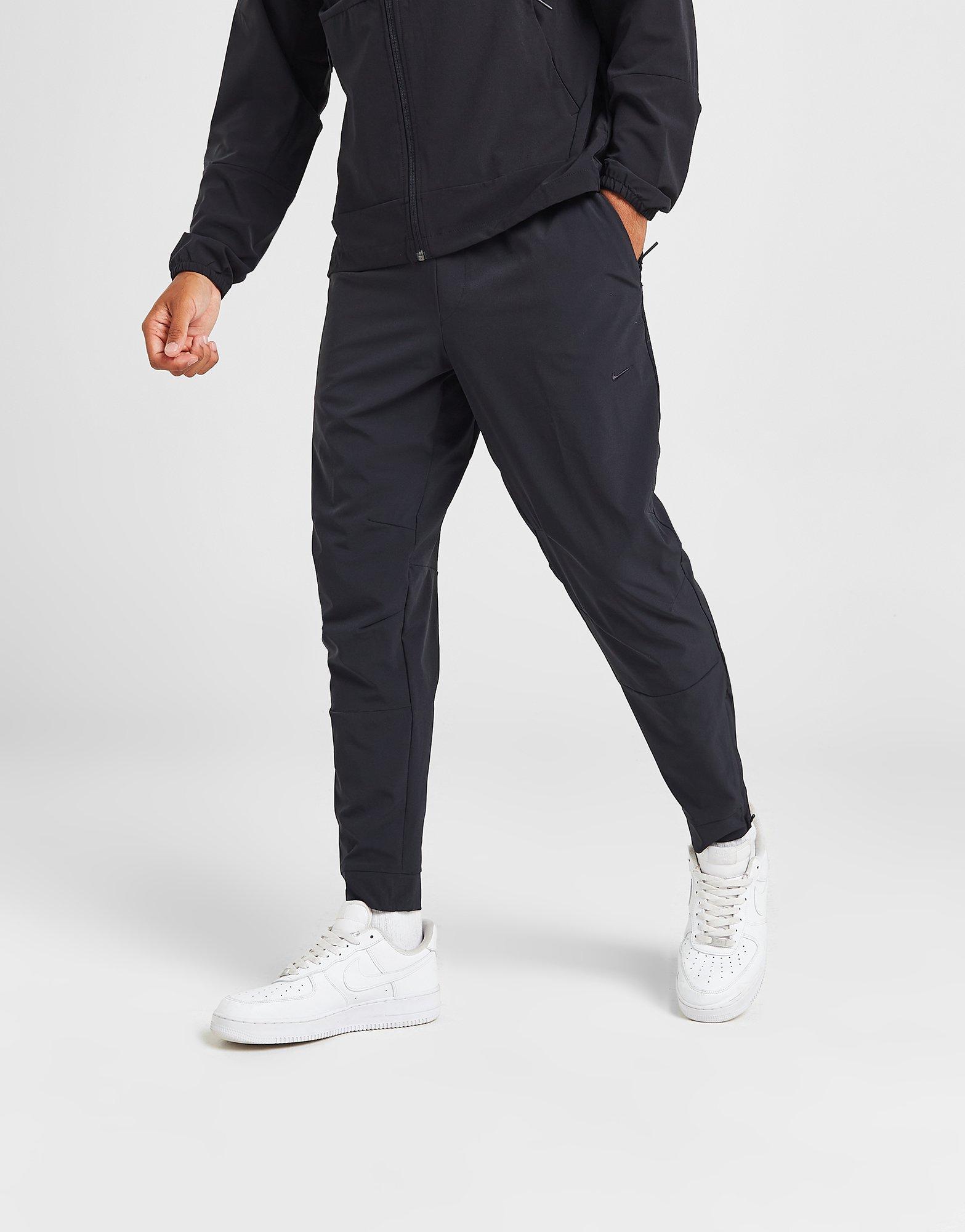 Pantalon de running fuselé tissé RUN Homme