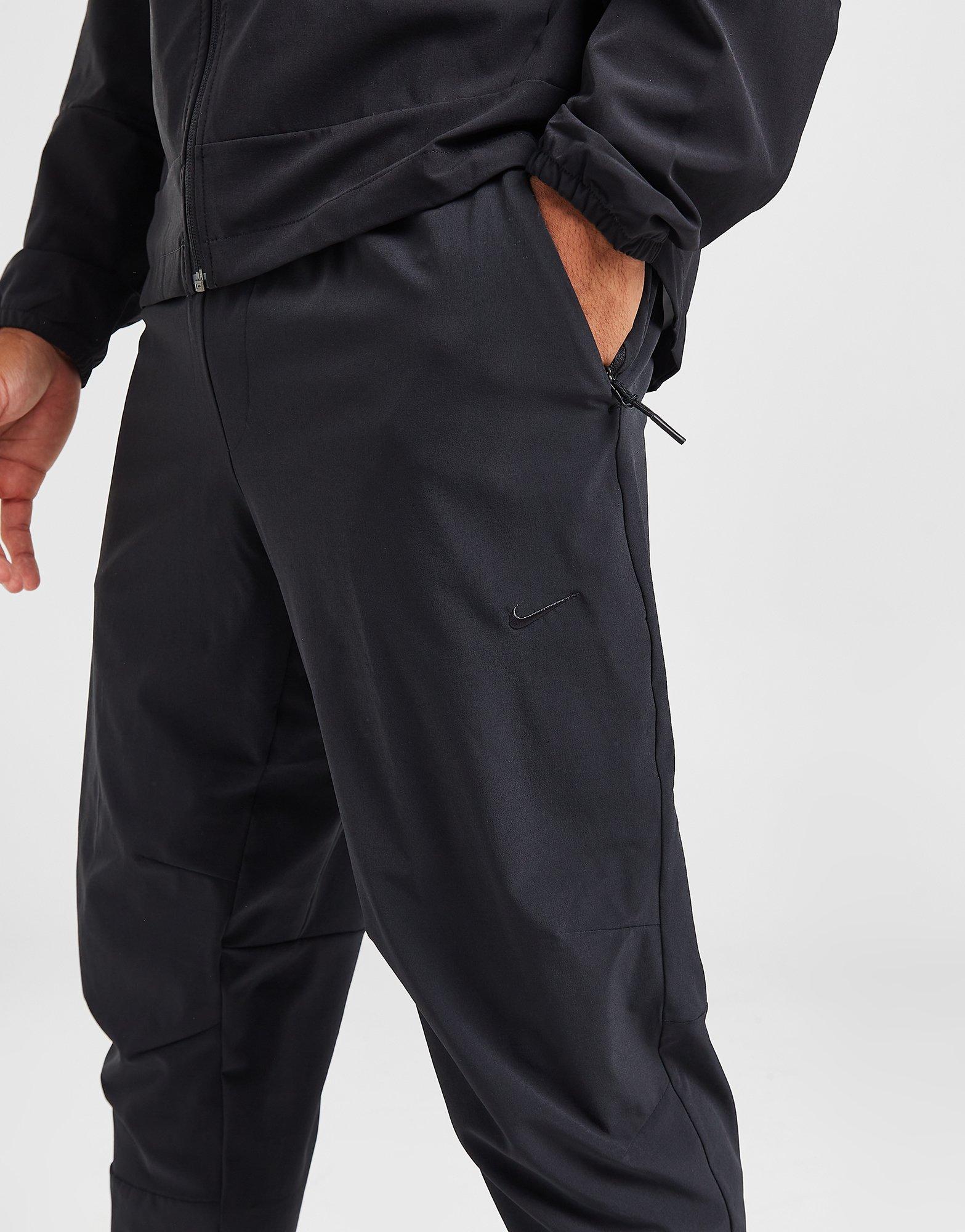 Black Nike Unlimited Woven Track Pants - JD Sports Global