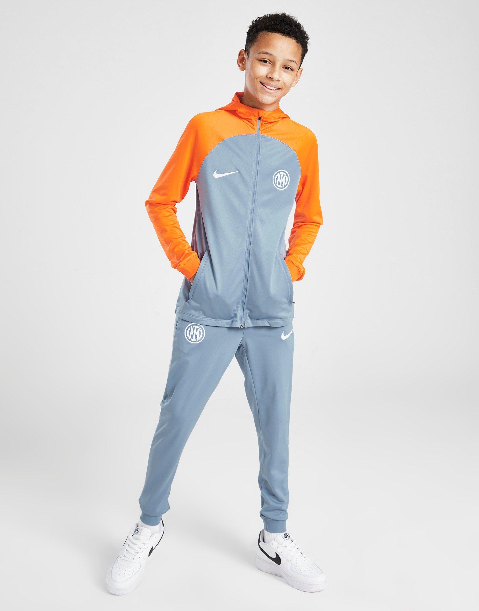 Nike junior best sale tribute tracksuit