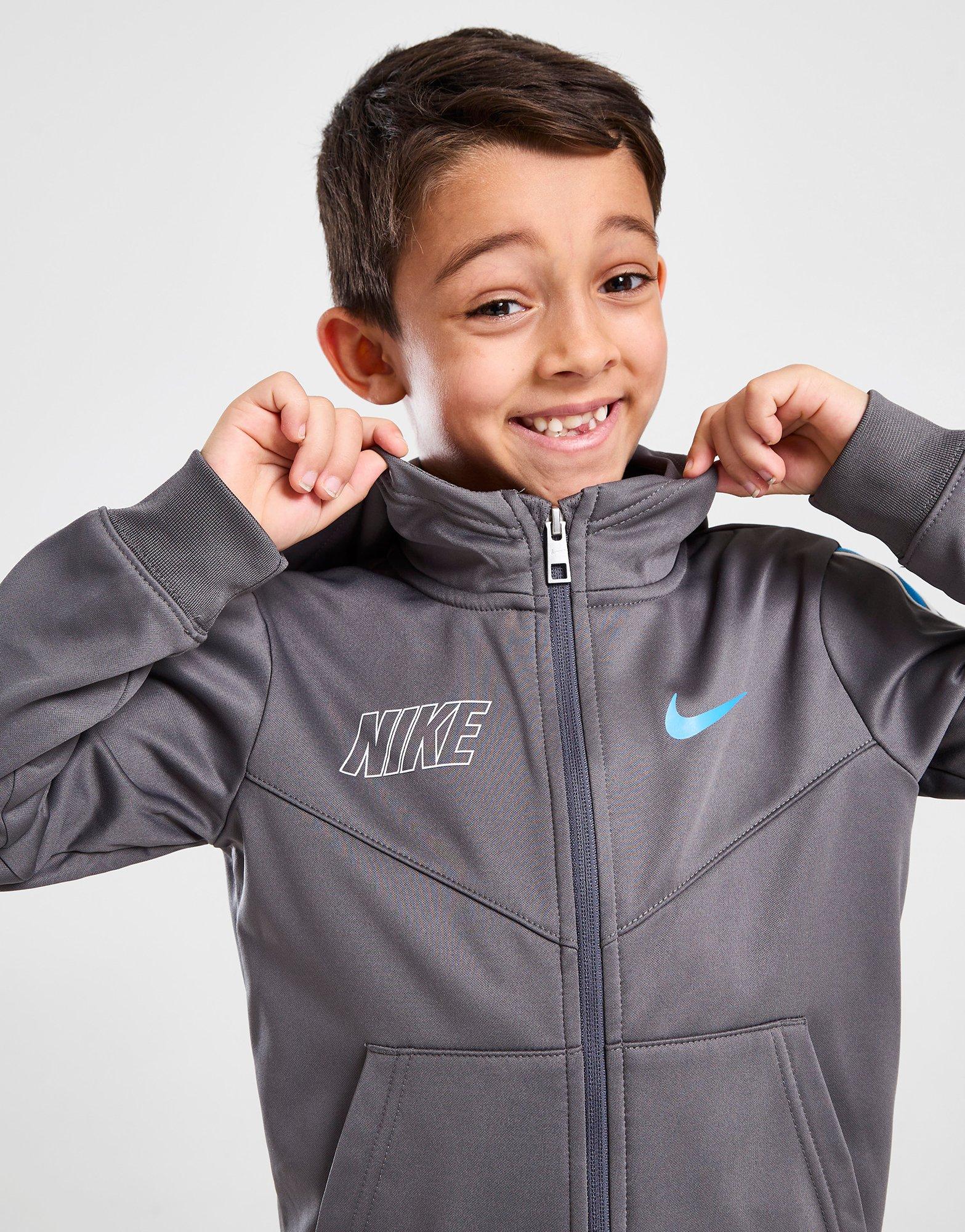 Nike repeat tape poly full zip tracksuit children online