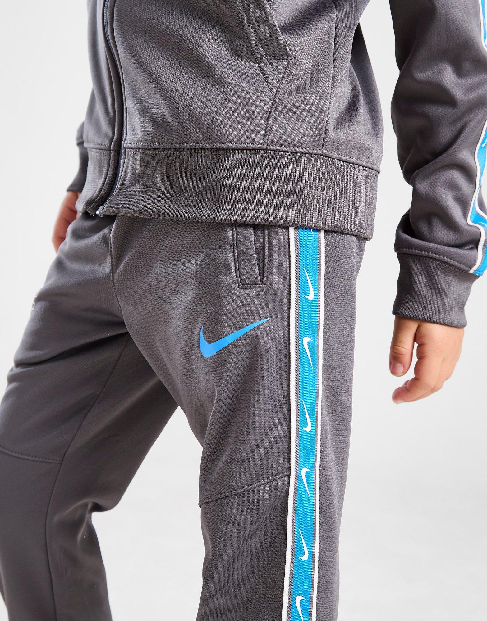 Nike taped cheap poly tracksuit