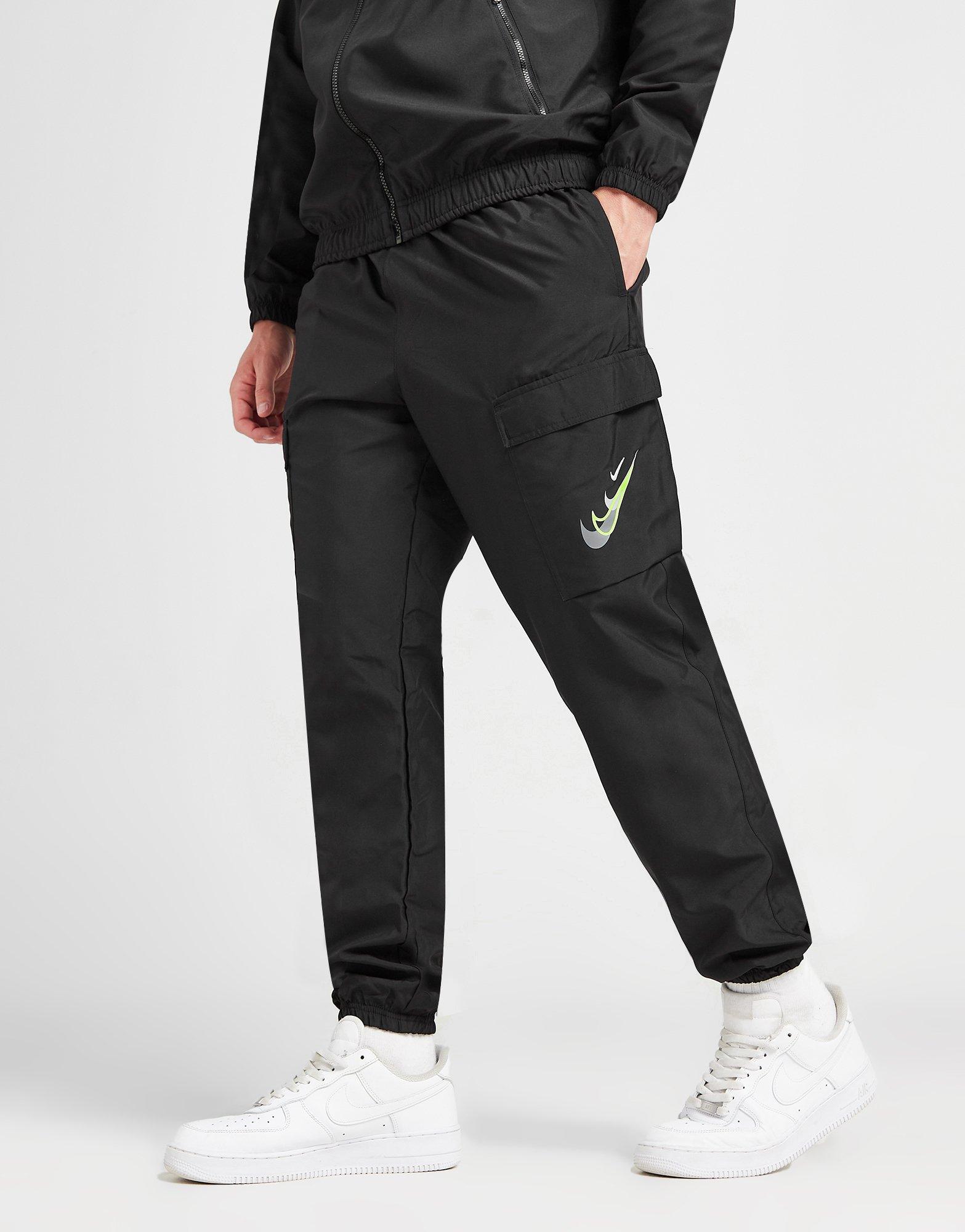 Nike swoosh on tour pack online cuffed cargo joggers in black