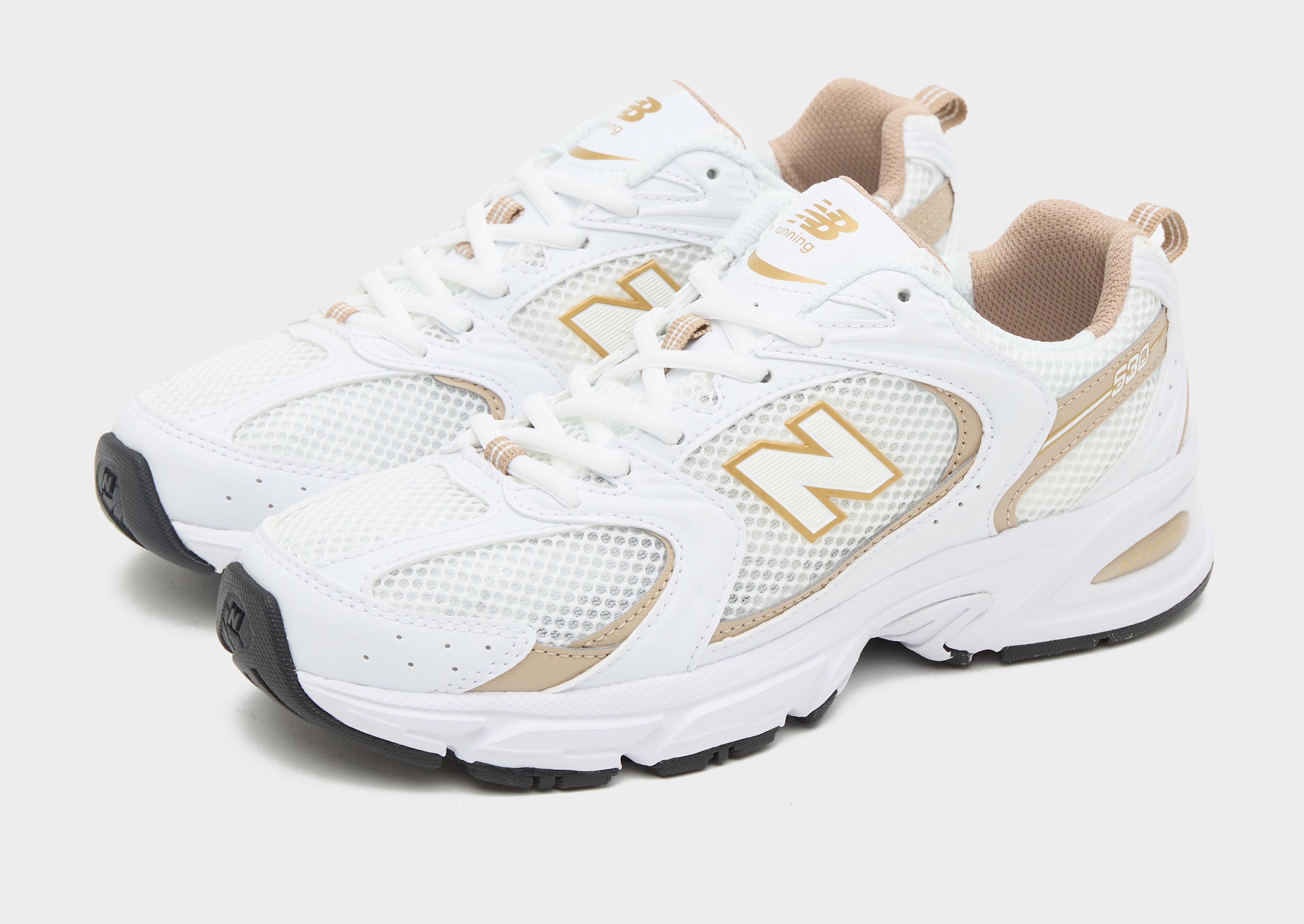 New balance 247 sales donna oro