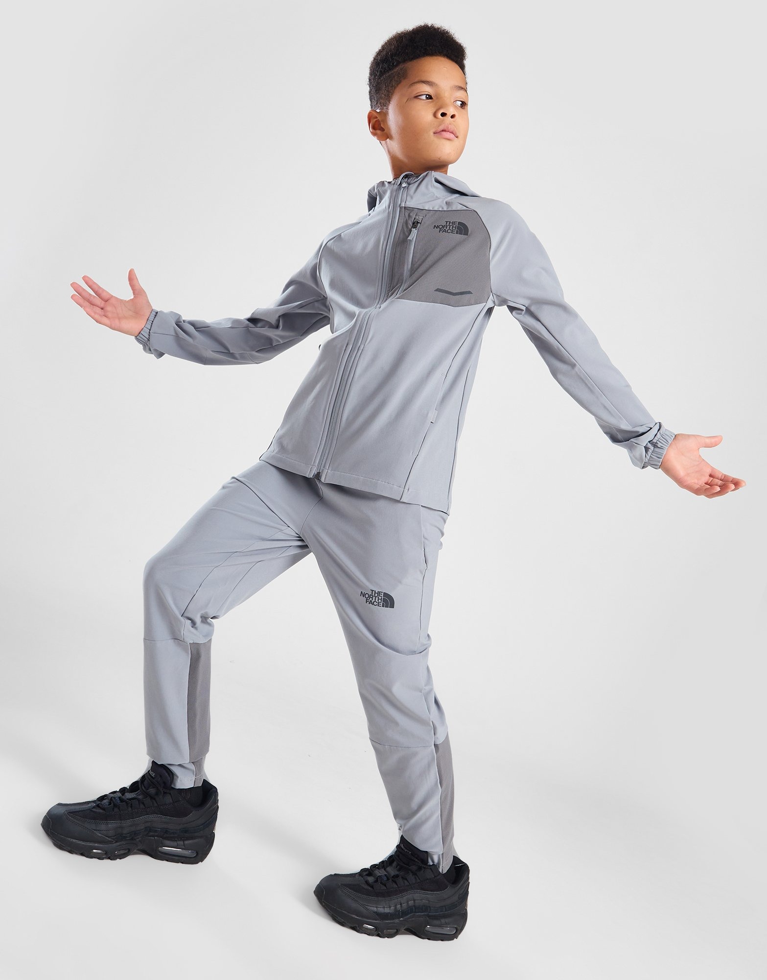 Grey The North Face Performance Woven Track Pants Junior | JD Sports UK