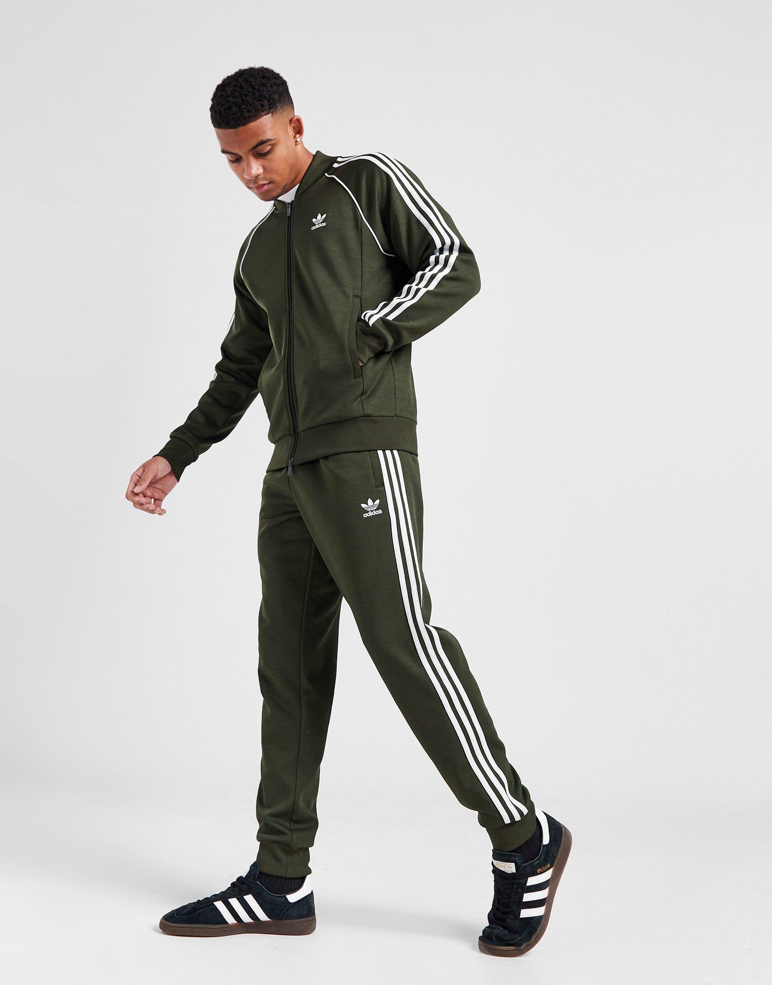 Adidas originals vintage joggers with taping in green clearance ce4827