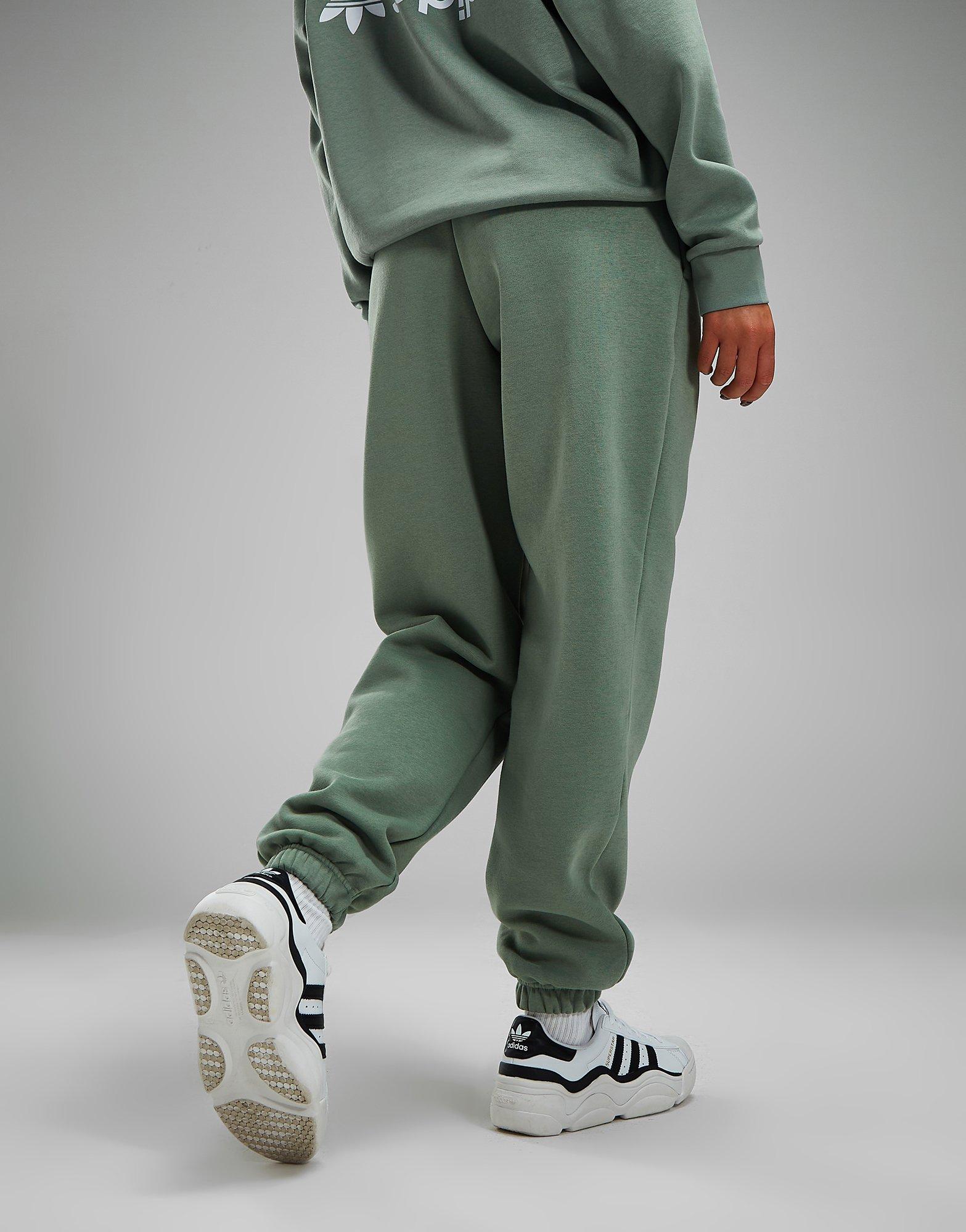 Green adidas hot sale joggers womens