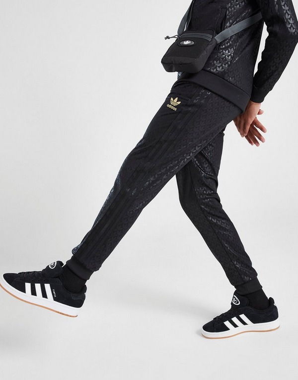 Adidas womens active black capri pants, white stripes on sides, size Large  (L)