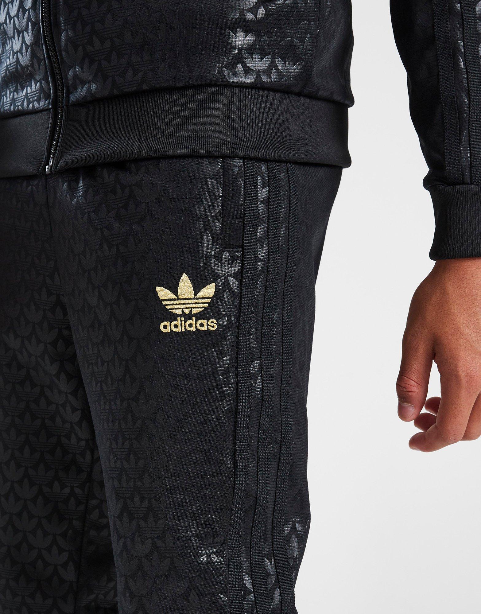 adidas Allover Print SST Track Pants - Black | adidas Switzerland