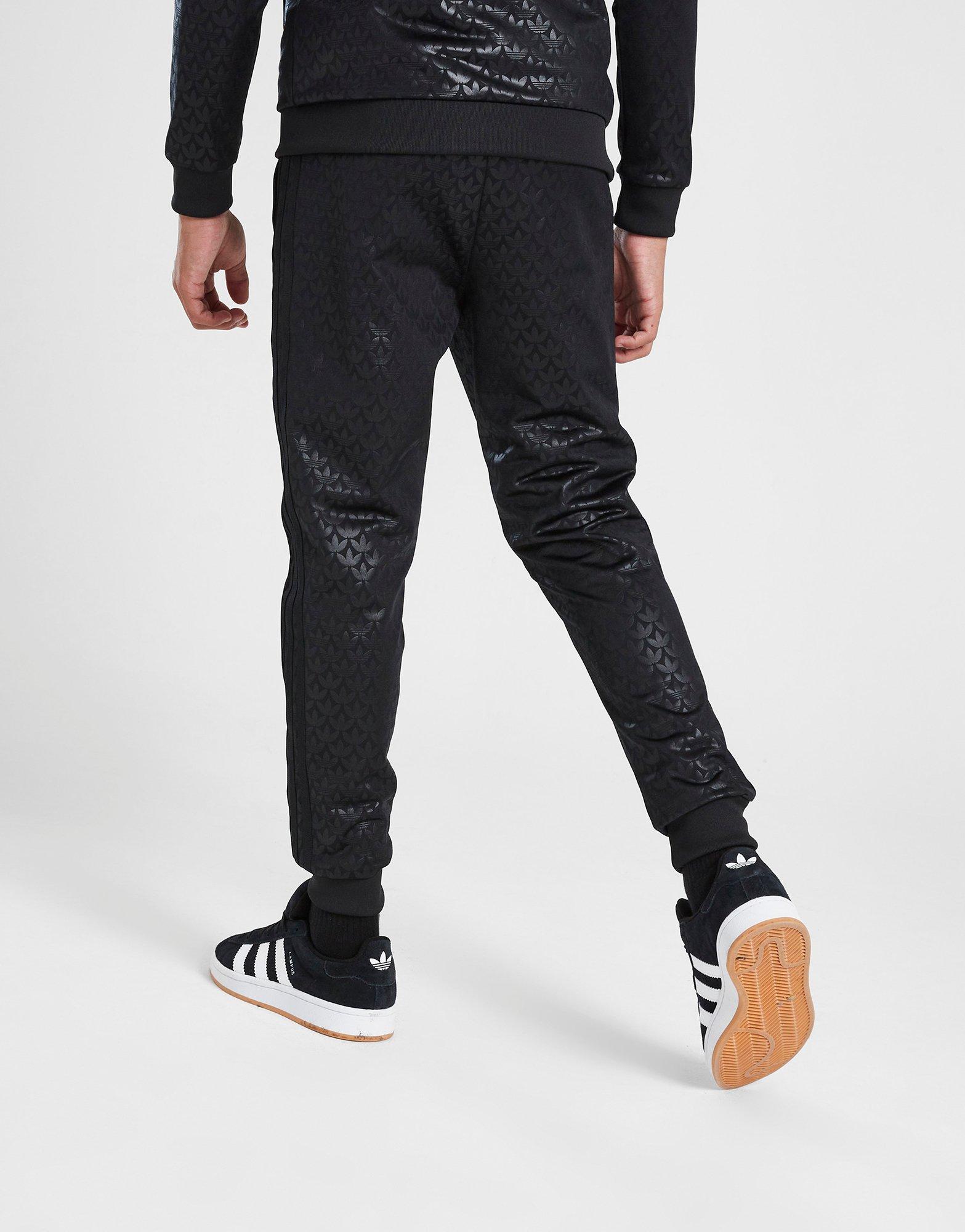 adidas Allover Print SST Track Pants - Black | adidas Switzerland