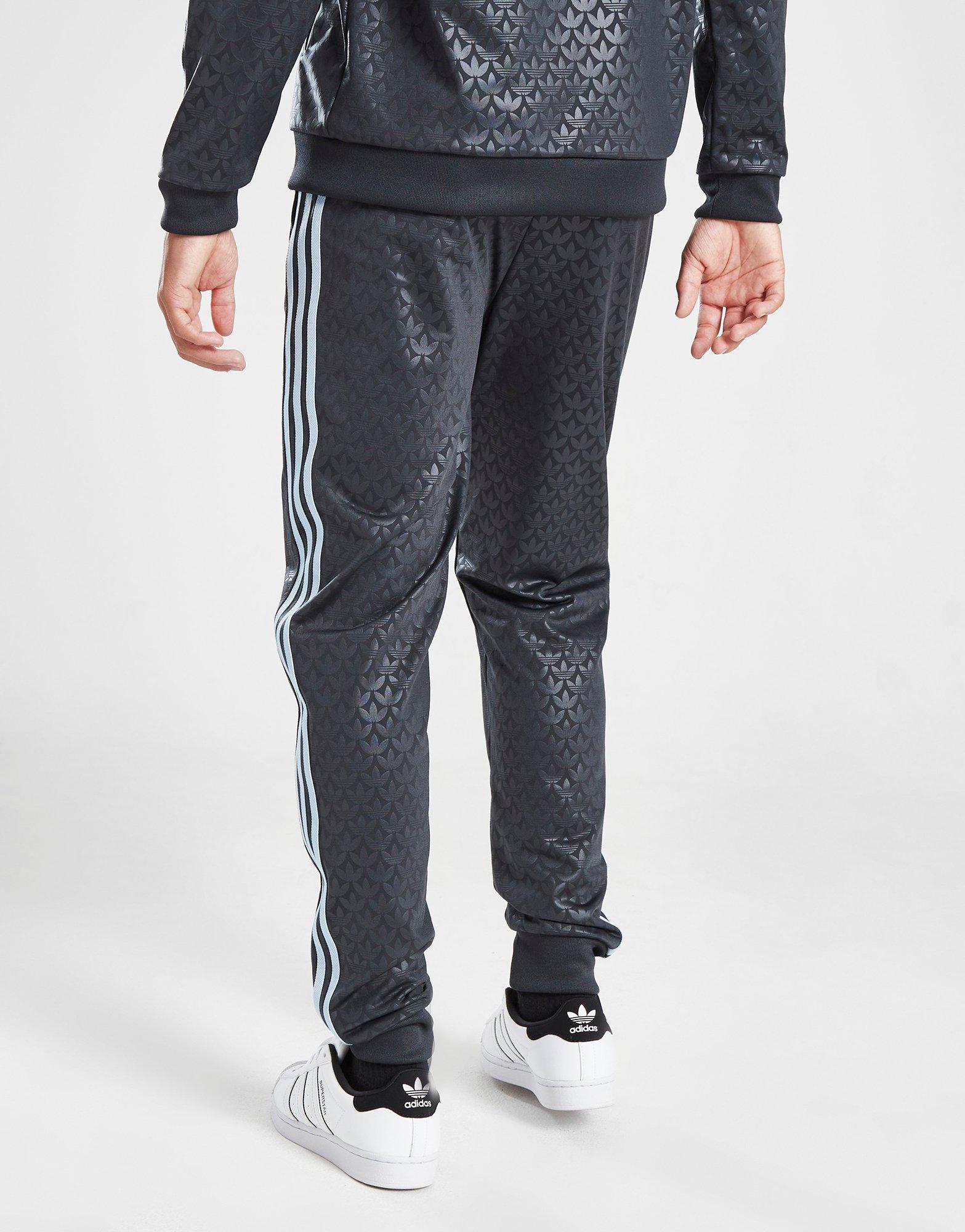 adidas Allover Print SST Track Pants - Black | adidas Switzerland