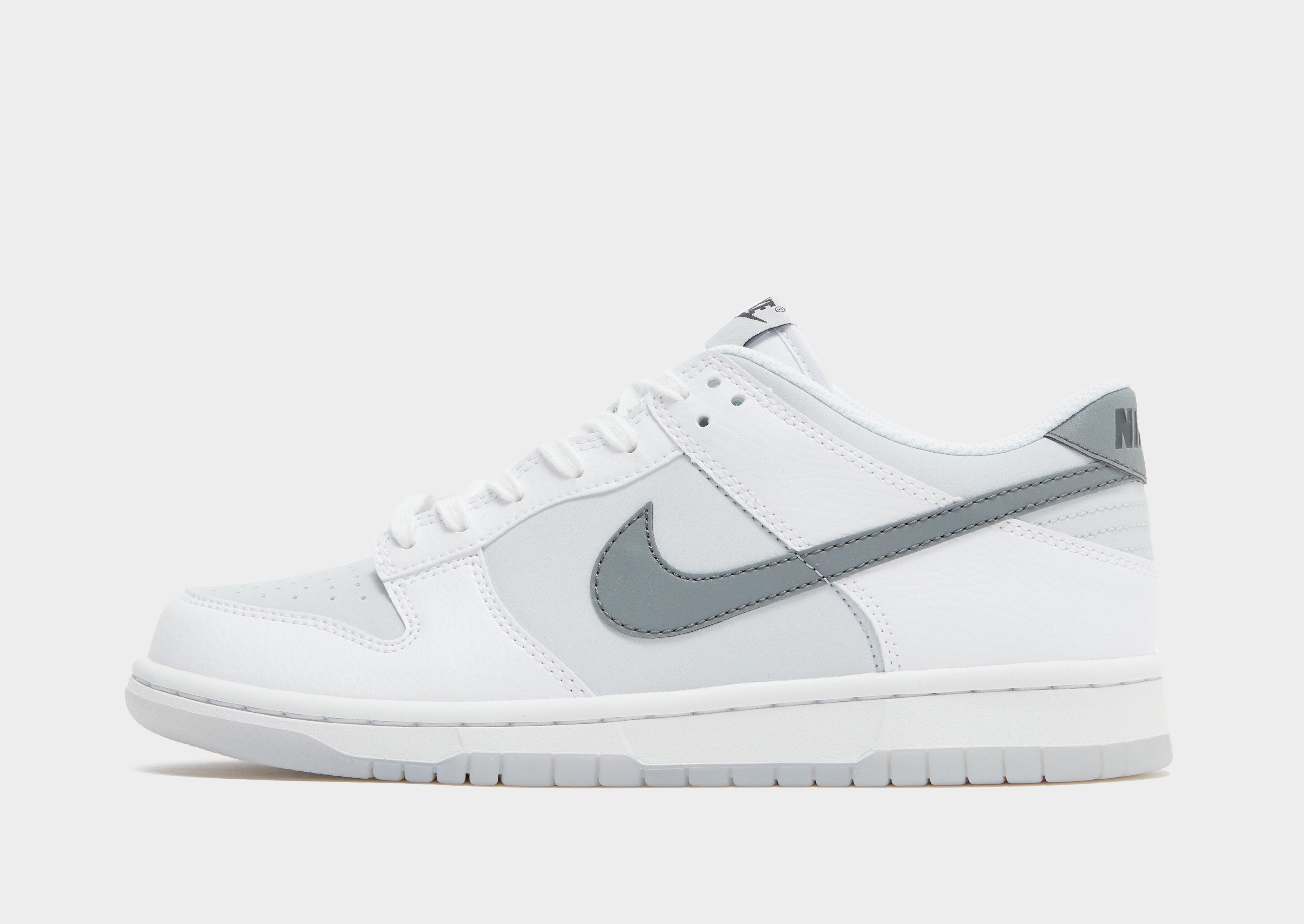 This Nike Dunk Low Features Mini Swoosh Details And A Wolf Grey