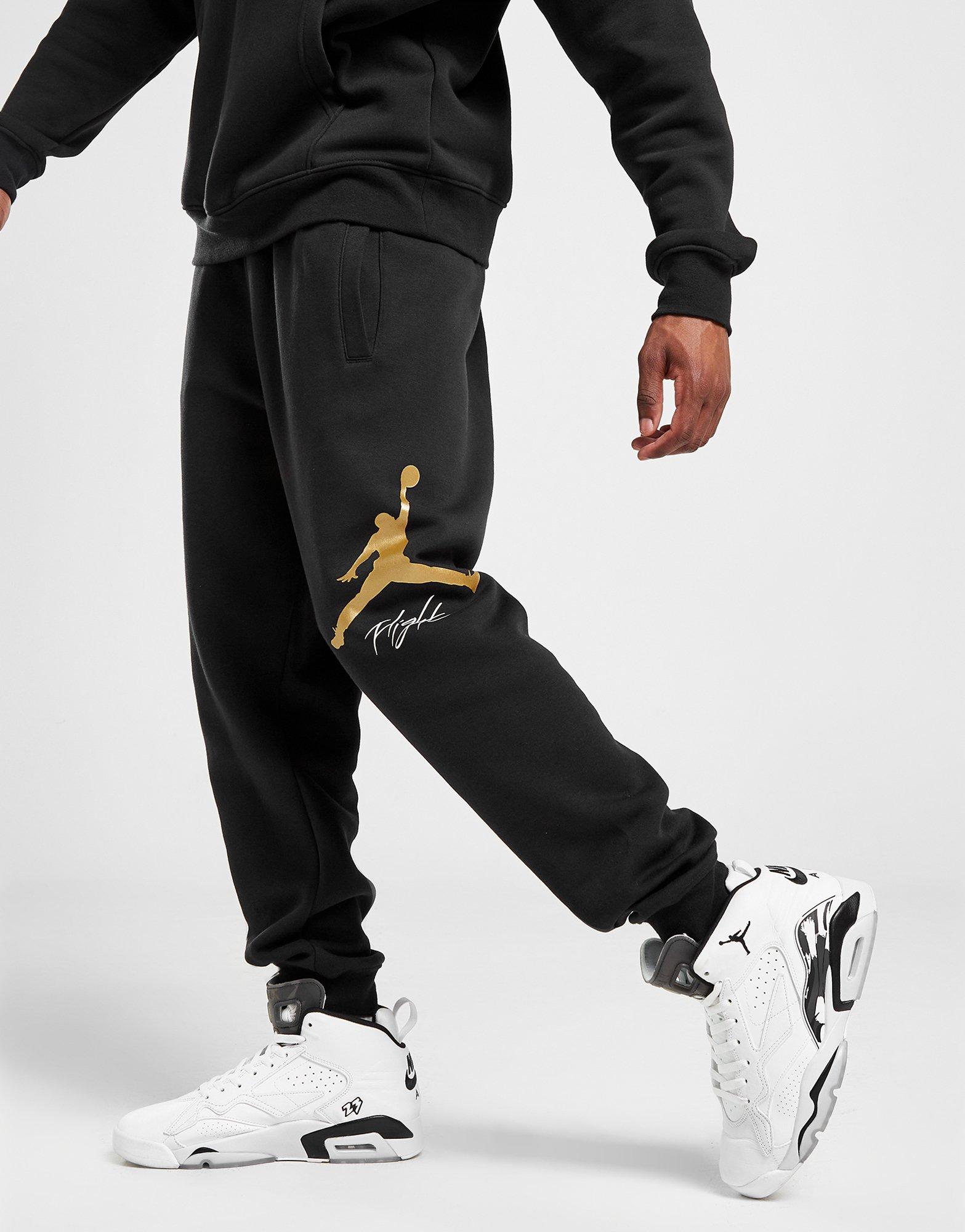 black and gold jordan pants