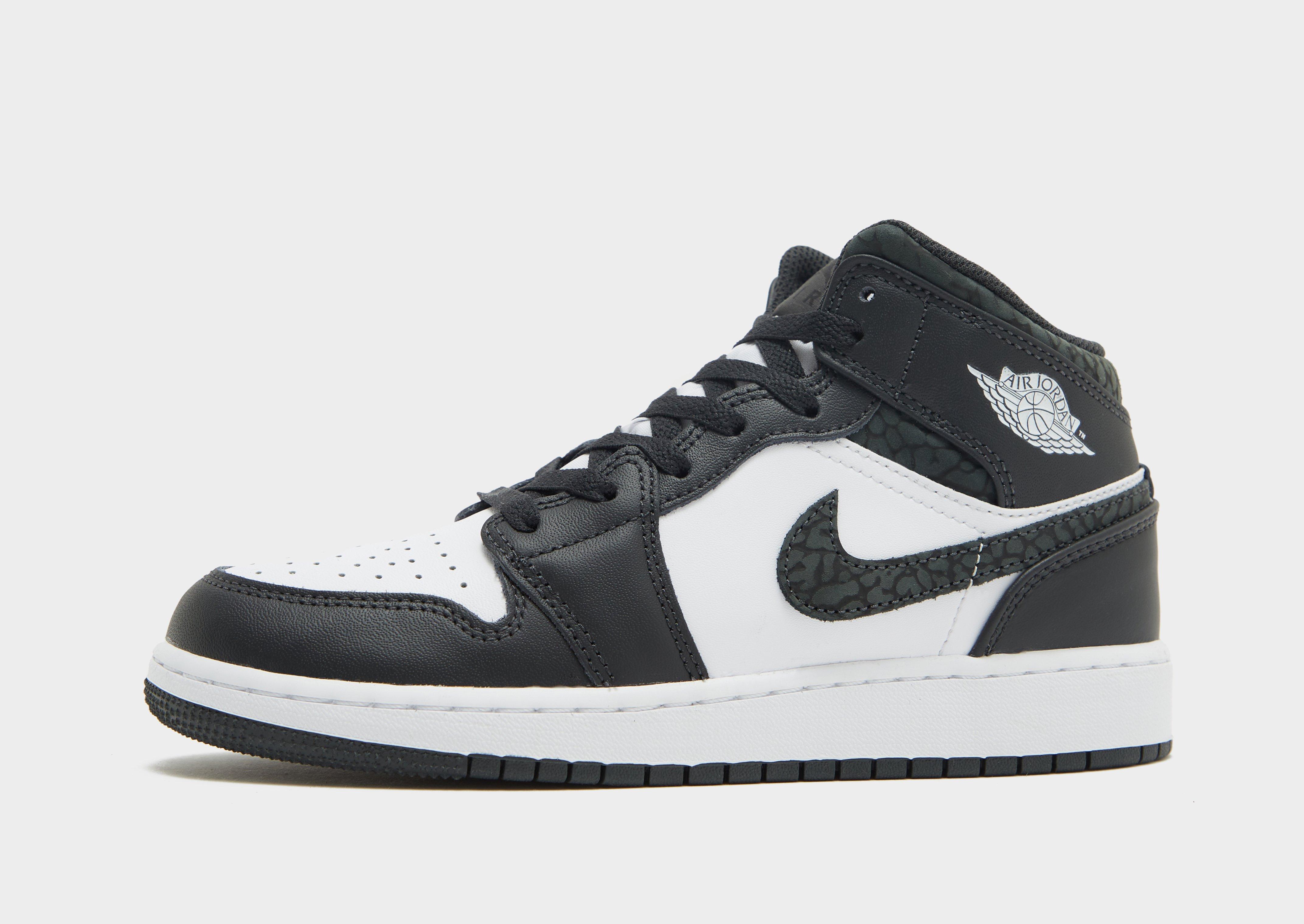 Black and white on sale jordan 1 junior