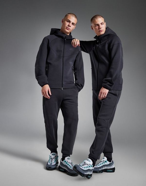 Nike Sportswear - Pantalon de jogging Tech Fleece Femmes / Gris foncé