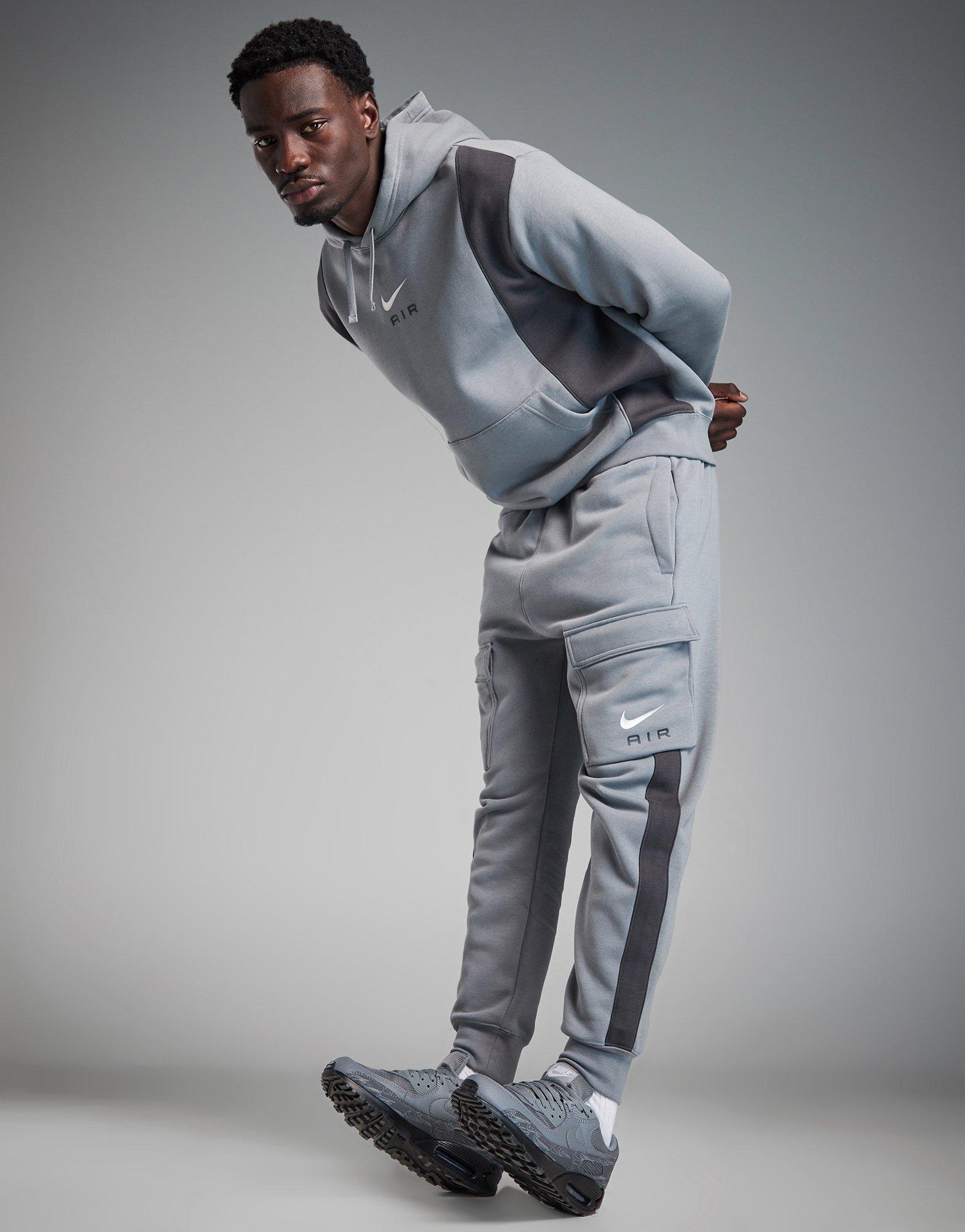 Swoosh tracksuit online grey