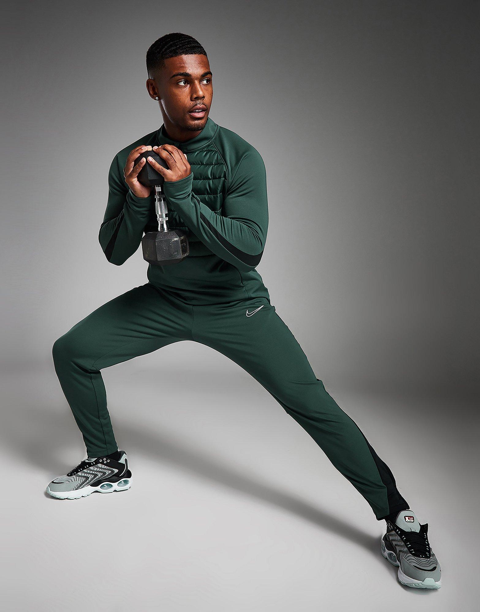 Calças de futebol Therma-FIT Nike Academy Winter Warrior para homem. Nike PT