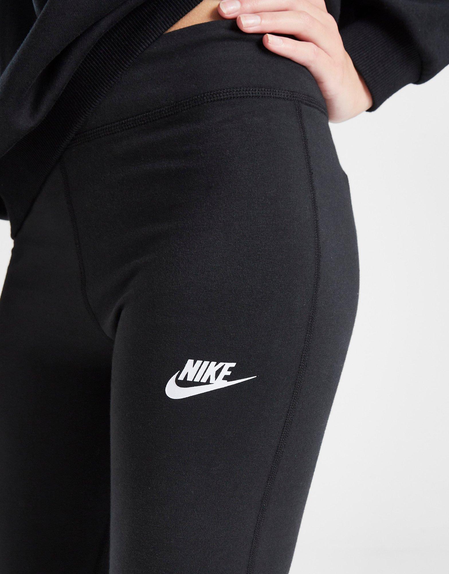 Leggings da bambina Nike nero con logo verde fluo