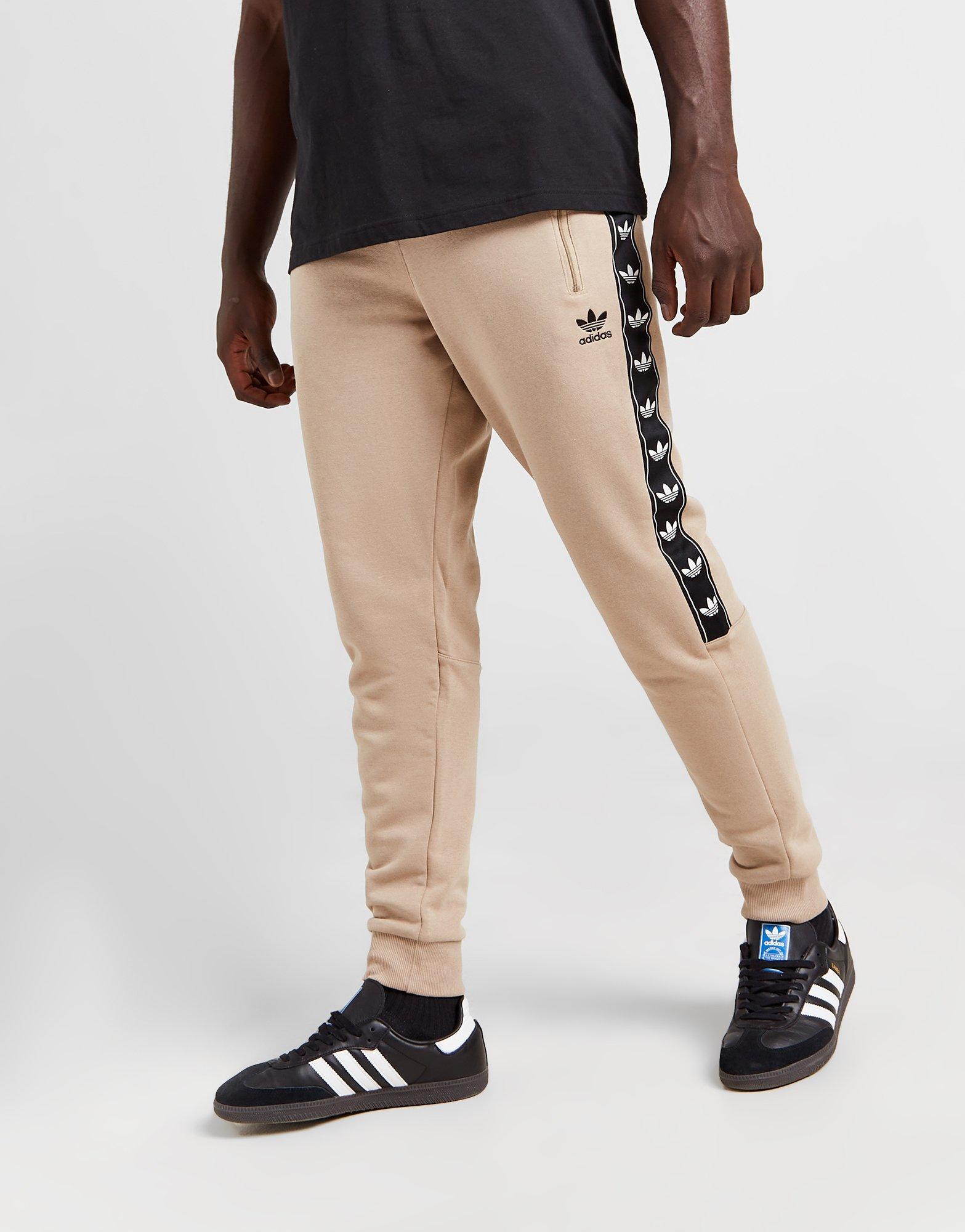 Adidas originals taped discount poly track pants