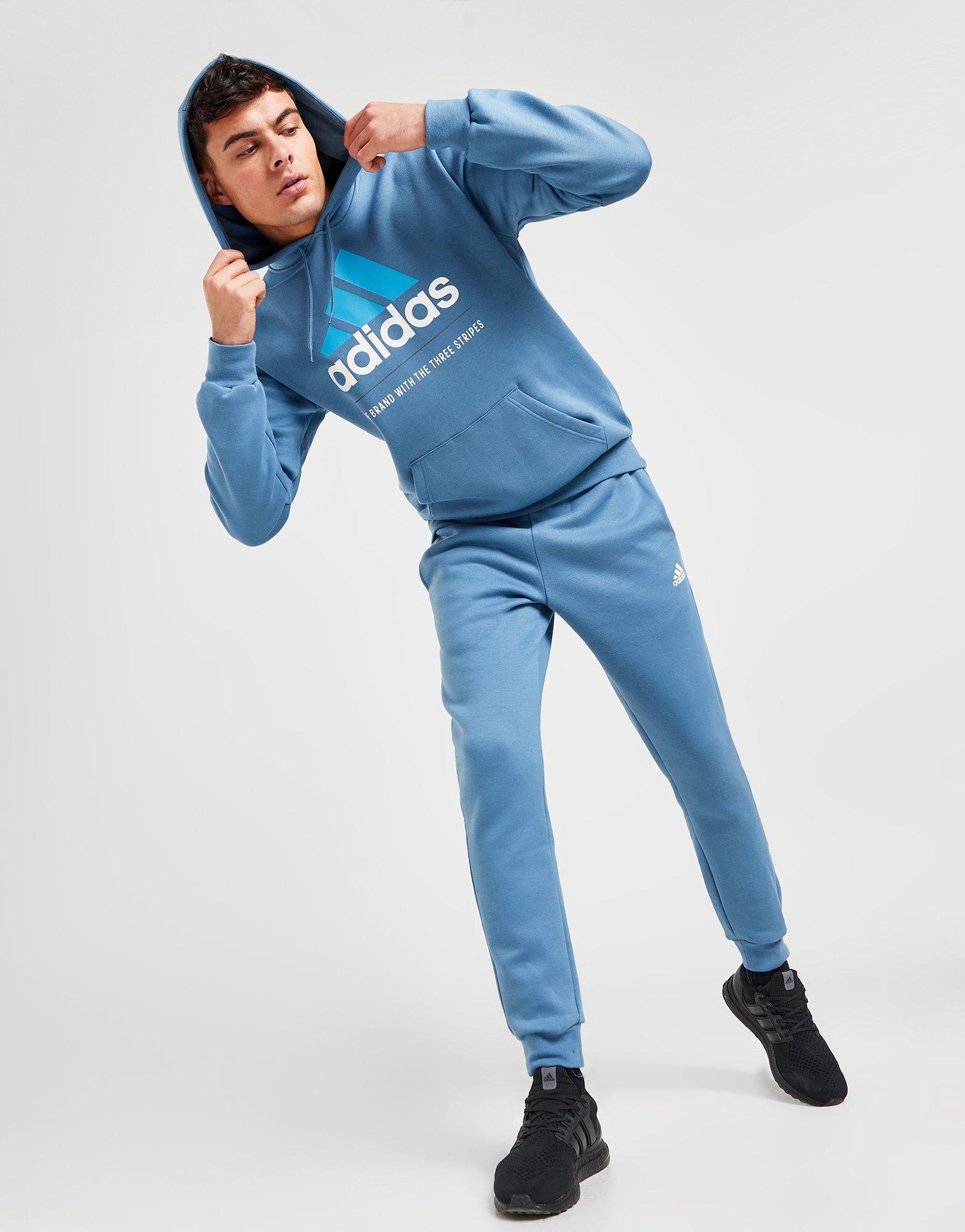 Blue adidas Badge of Sport Logo Tracksuit - JD Sports Global