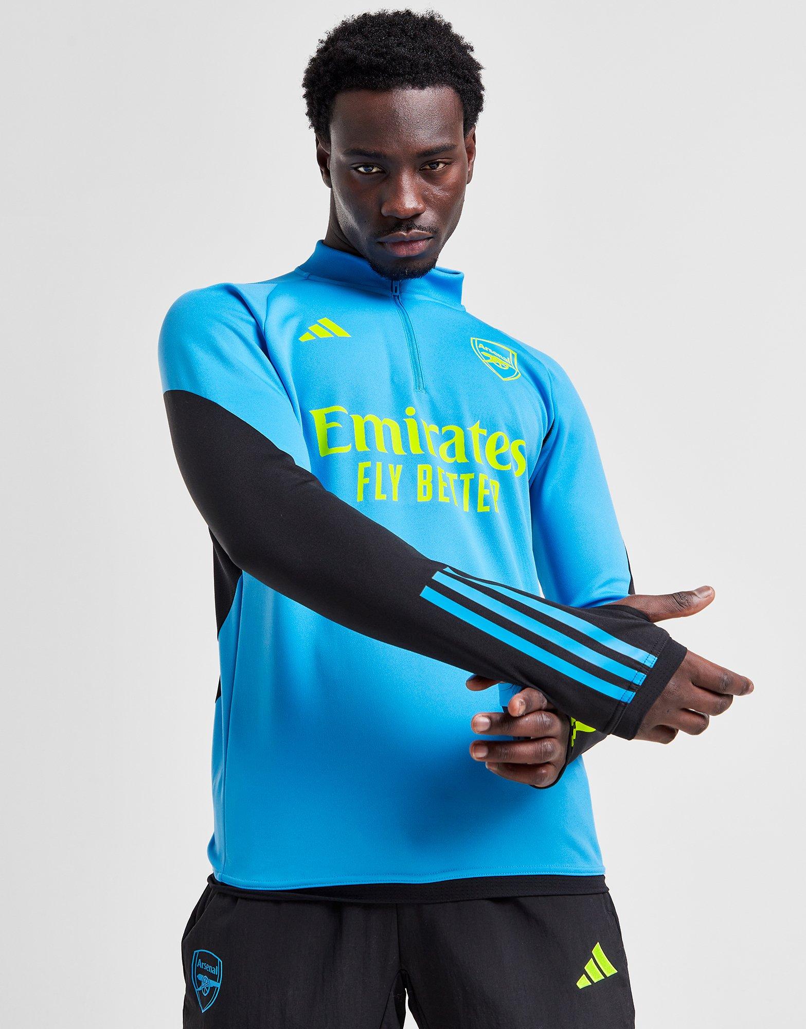 Arsenal green training store top