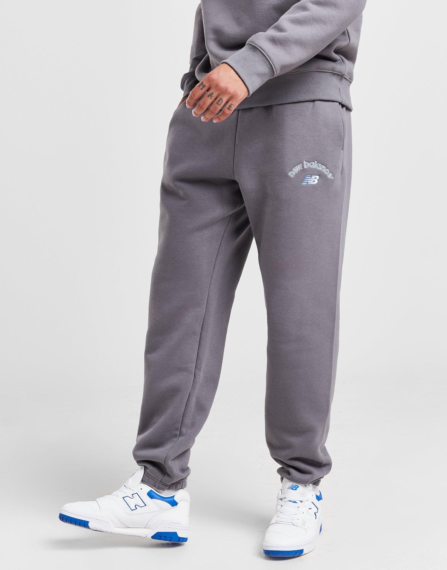 New Balance unisex collegiate joggers in grey - ShopStyle Trousers