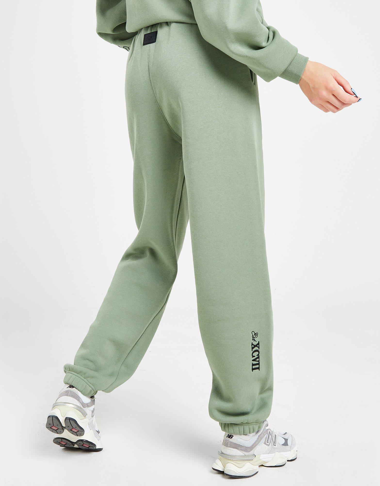 Buy Women Green Regular Fit Solid Casual Track Pants Online - 609555