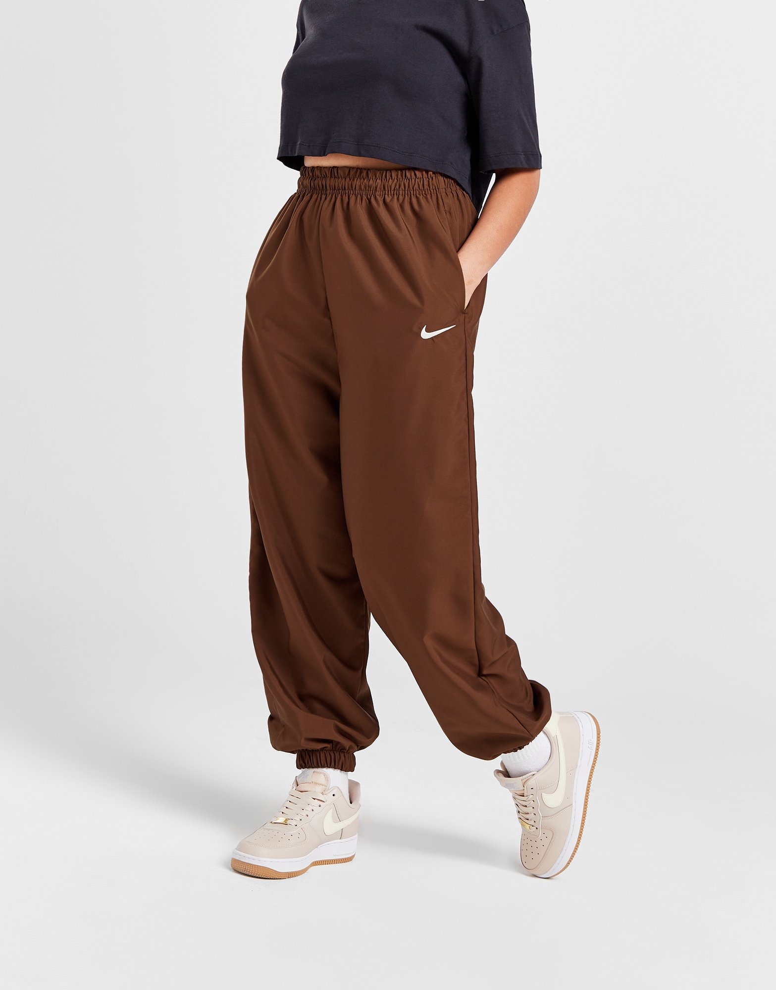 Brown nike pants on sale