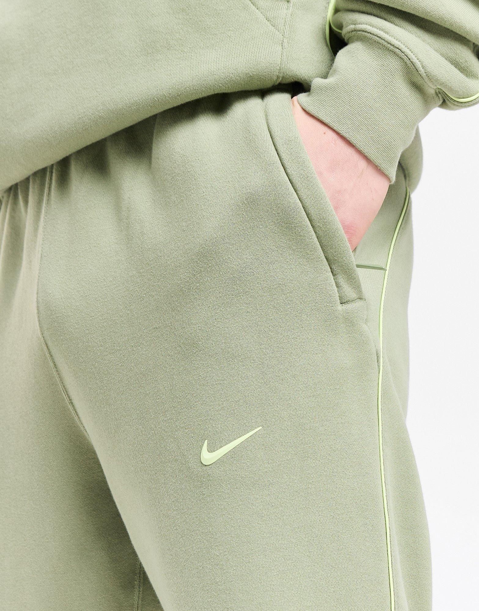 Nike Club fleece tapered joggers in oil green