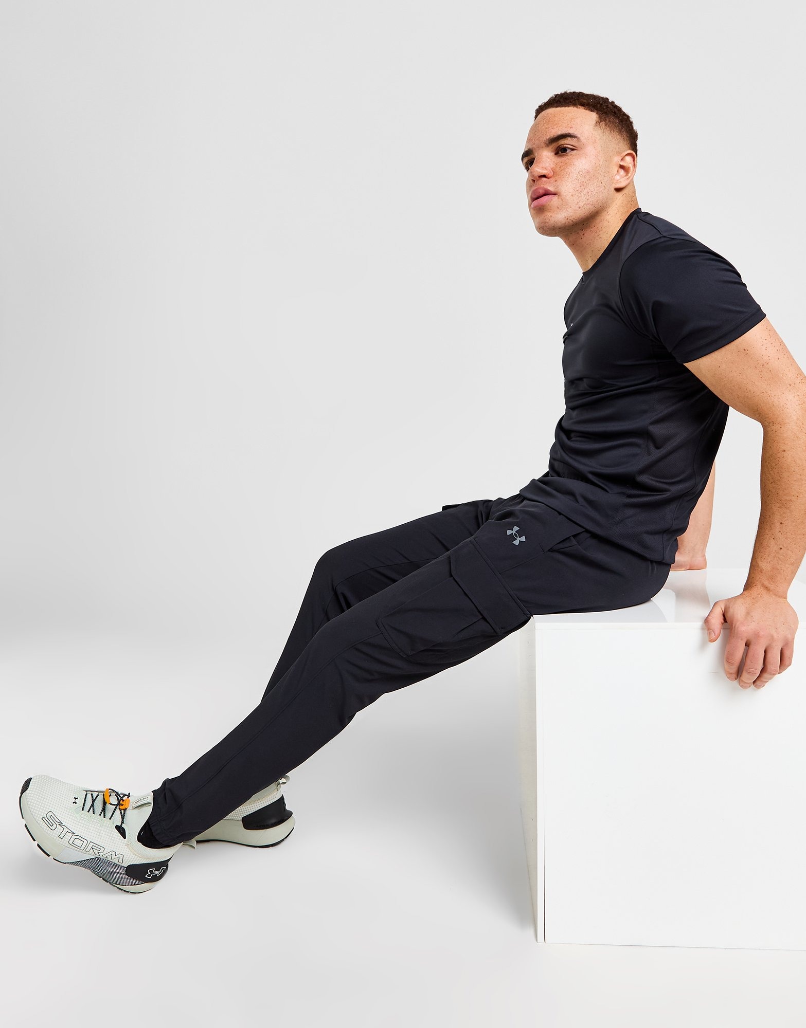 Black Under Armour Woven Cargo Track Pants | JD Sports UK